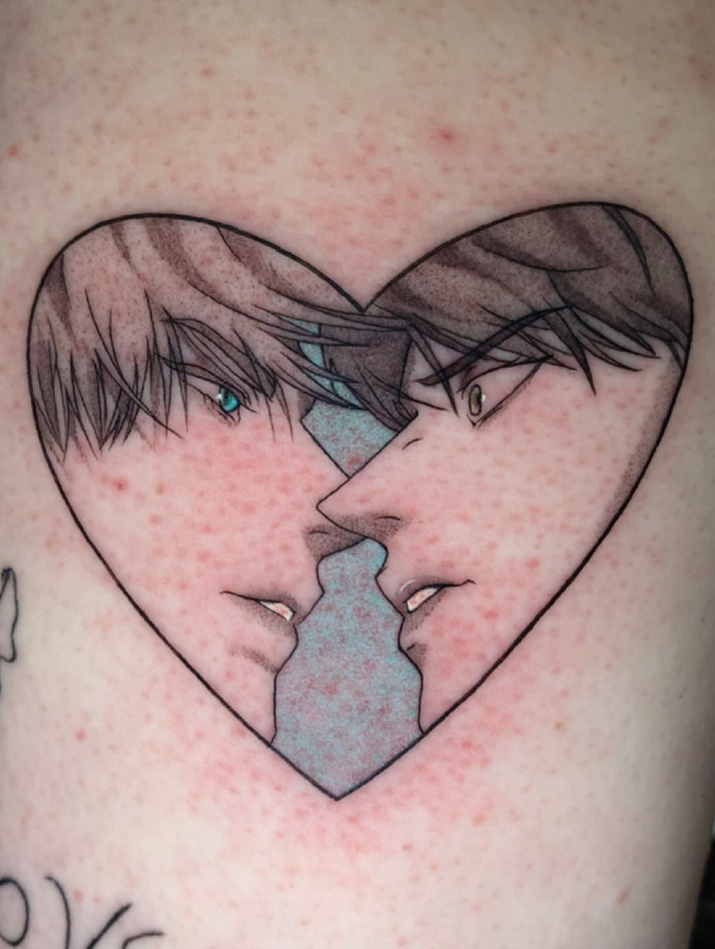 Anime couple anime tattoo on the chest by Maddie Rees