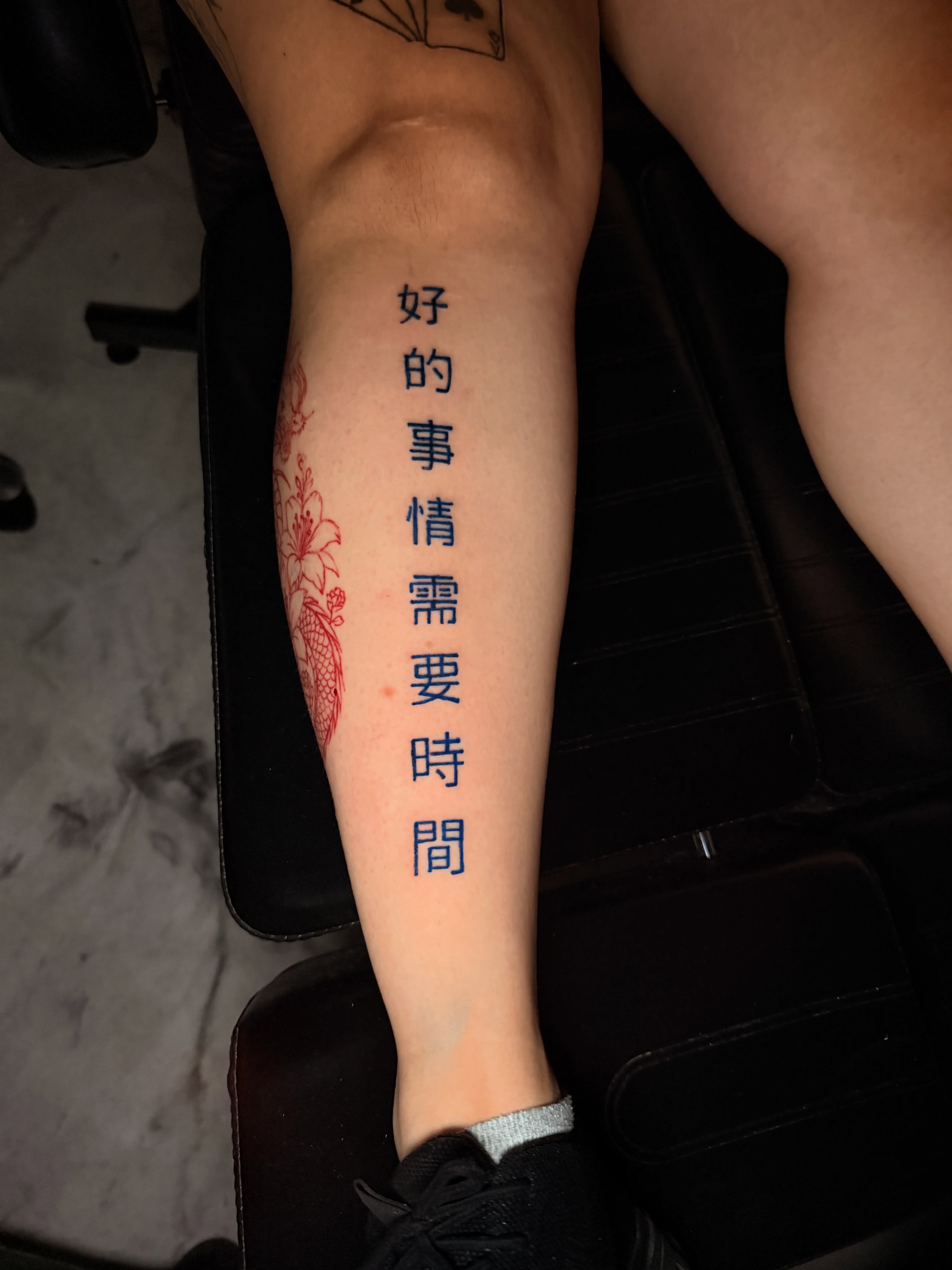 Good things need time lettering script tattoo on the forearm by Junior Sanchez Dfw