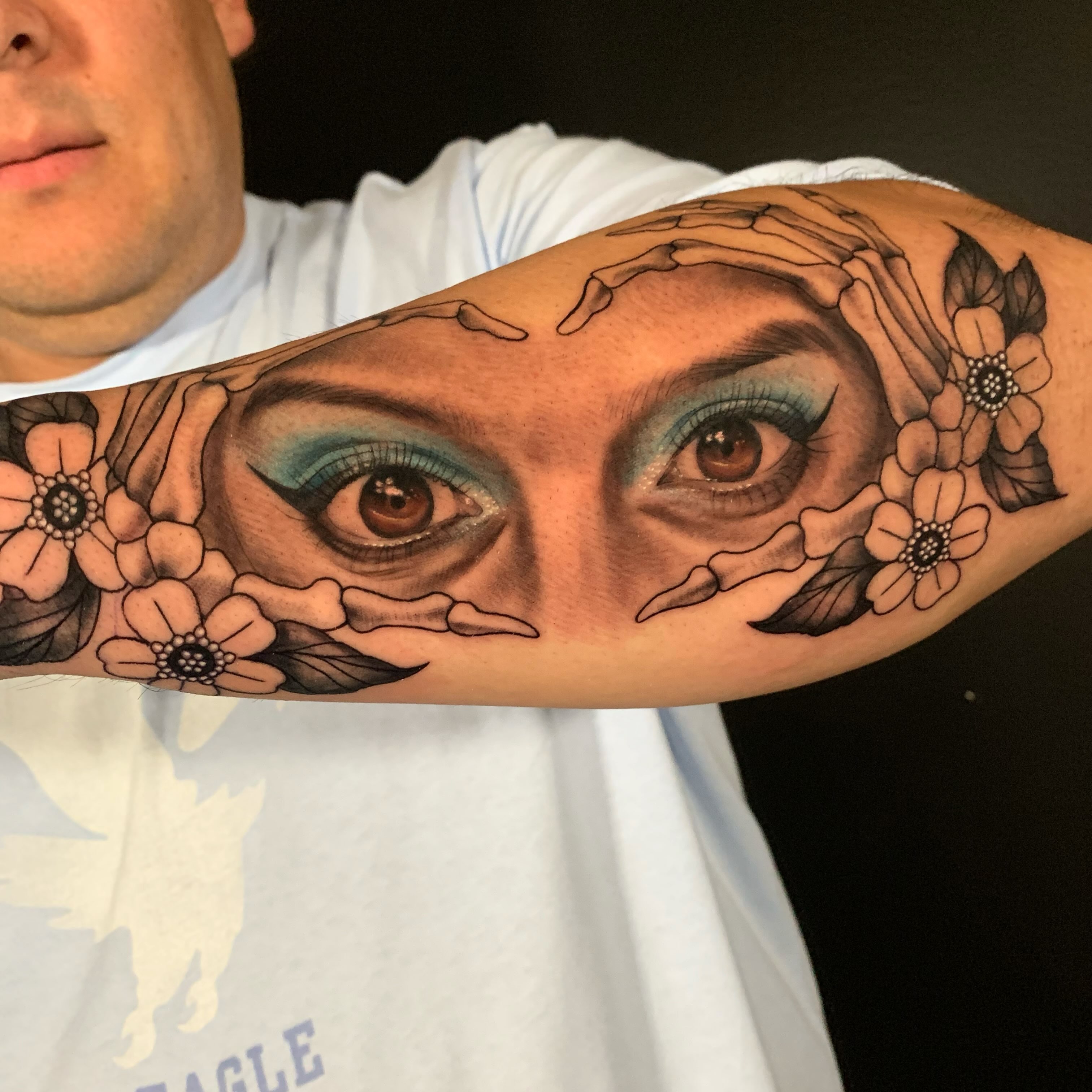 Eyes realism tattoo on the forearm by HAiZiE