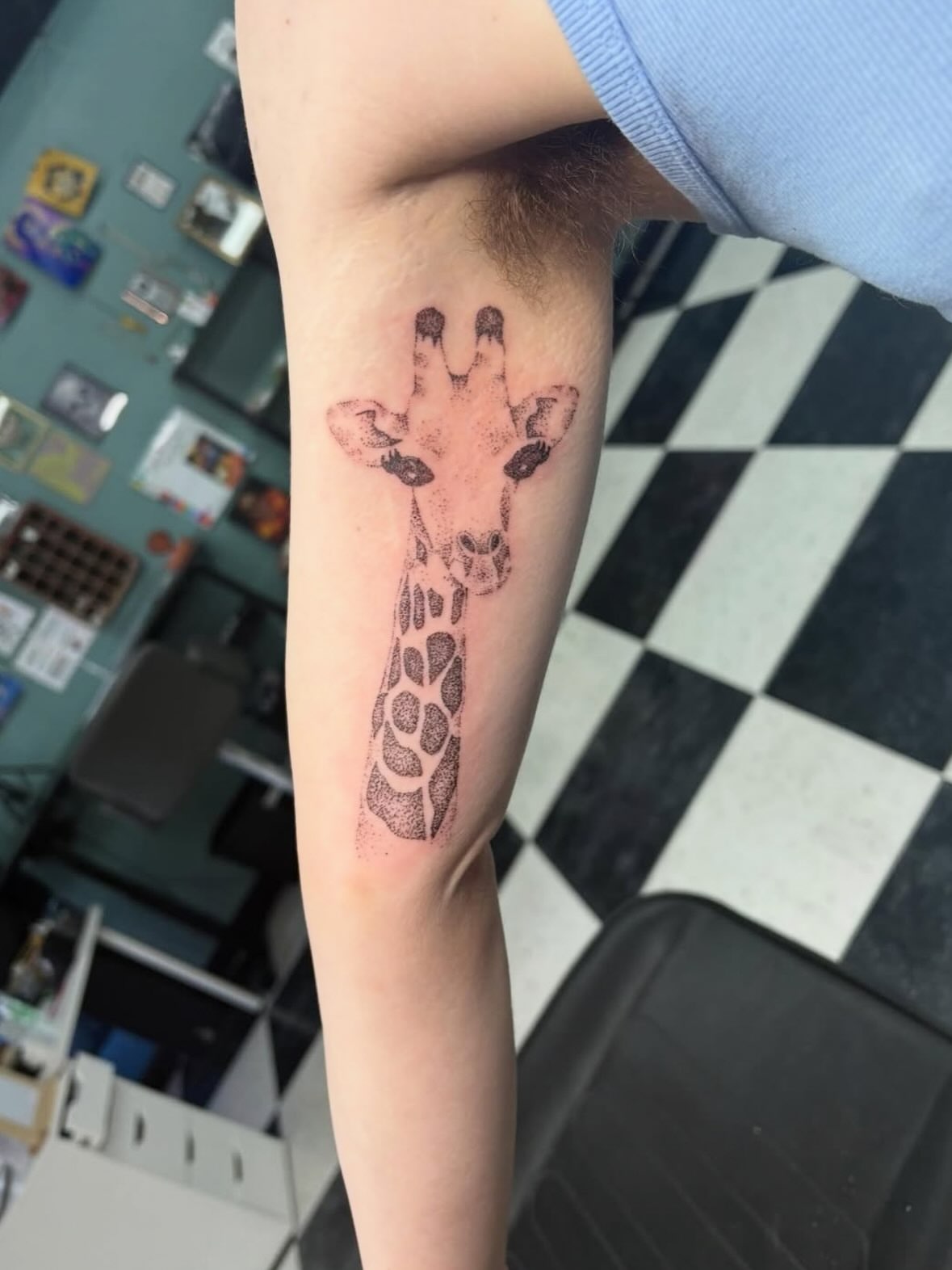 Giraffe dotwork tattoo on the forearm by Joe ⋆₊⋆☢︎⁺₊⚠︎₊⋆