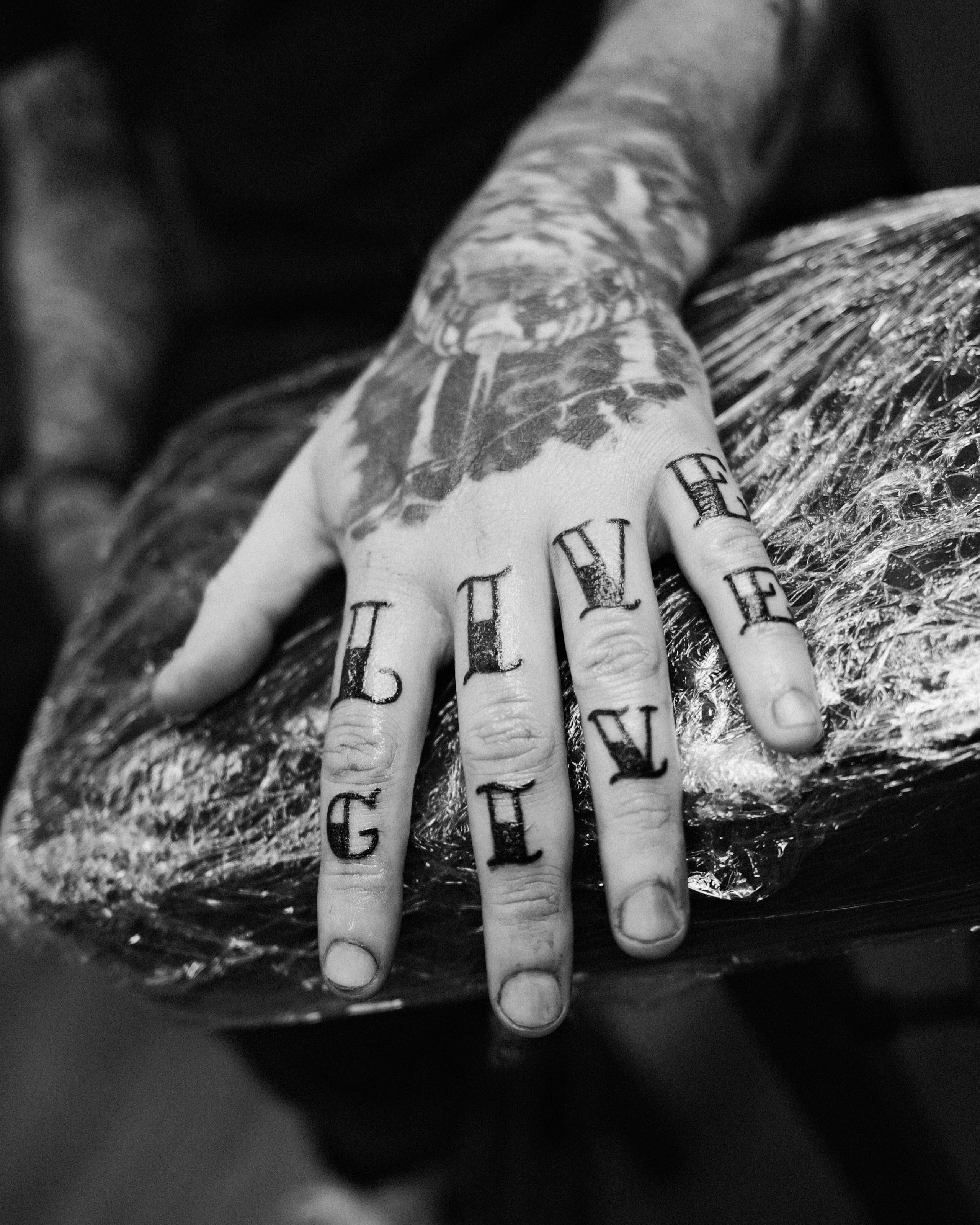 Lettering lettering script tattoo on the hand by Jonathan Clapp, San Antonio, Texas