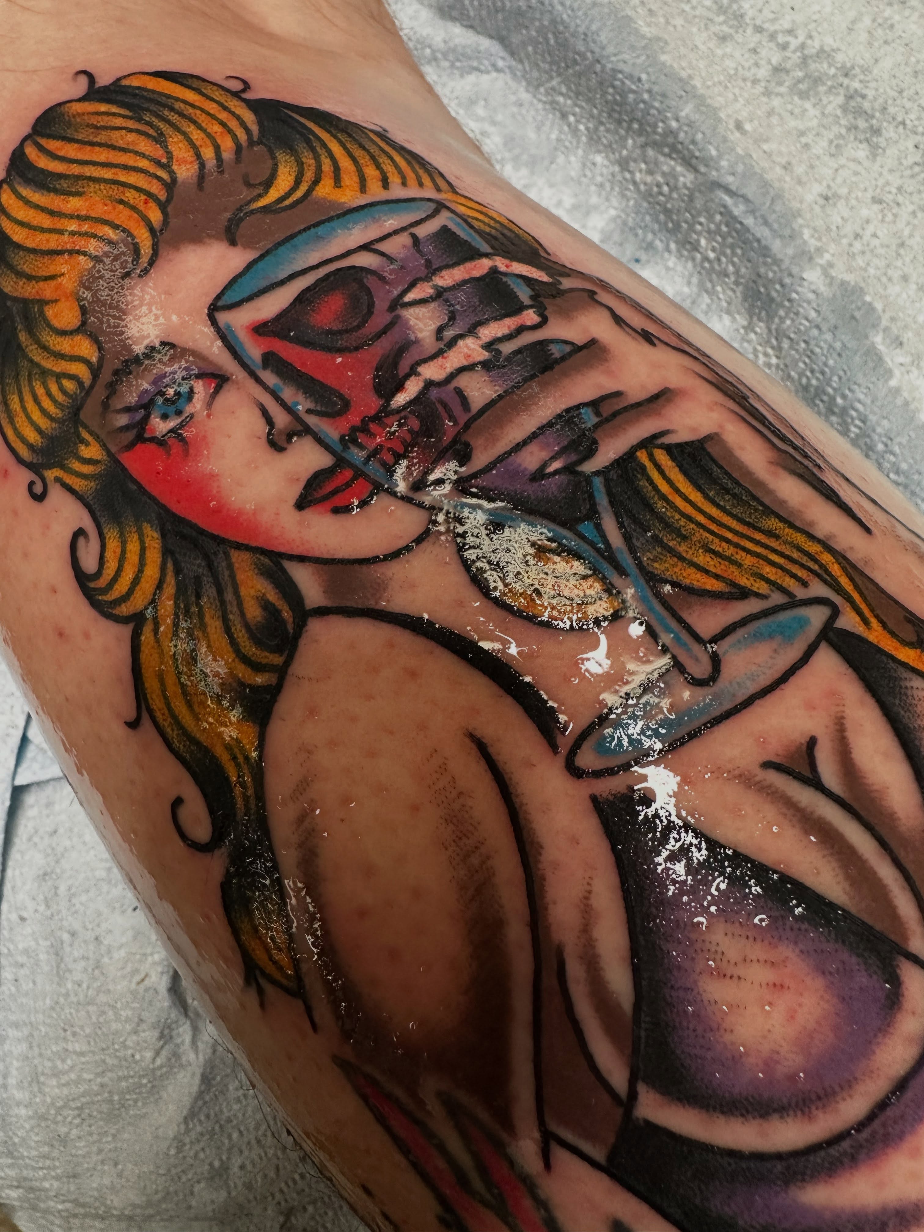 Woman drinking American traditional tattoo on the forearm by Spencer Crawford, Speedway, Indiana