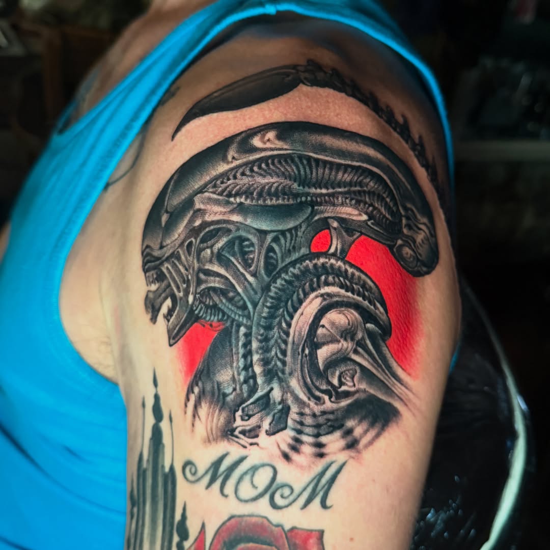 Alien head realism tattoo on the shoulder by JoshUA Bowers, Des Moines, Iowa