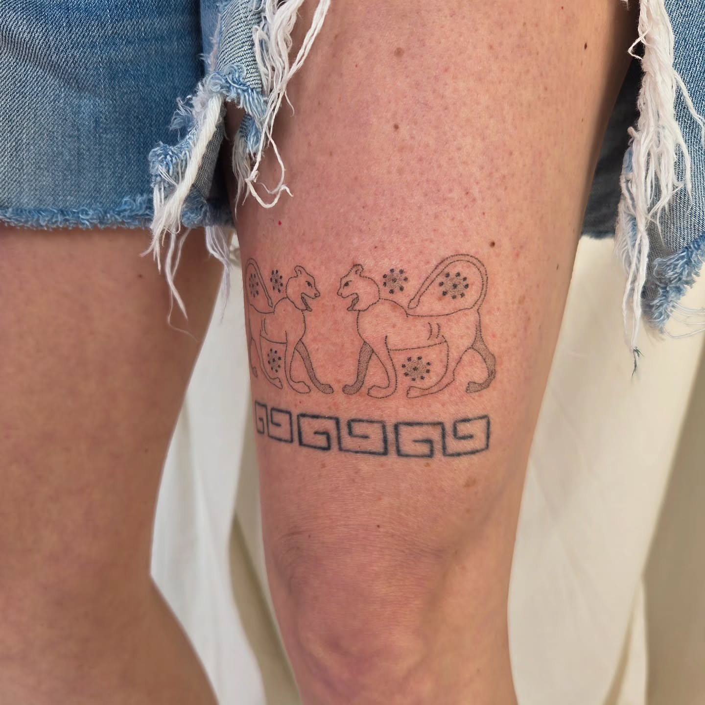 Squirrels geometric tattoo on the forearm by jules tattoos