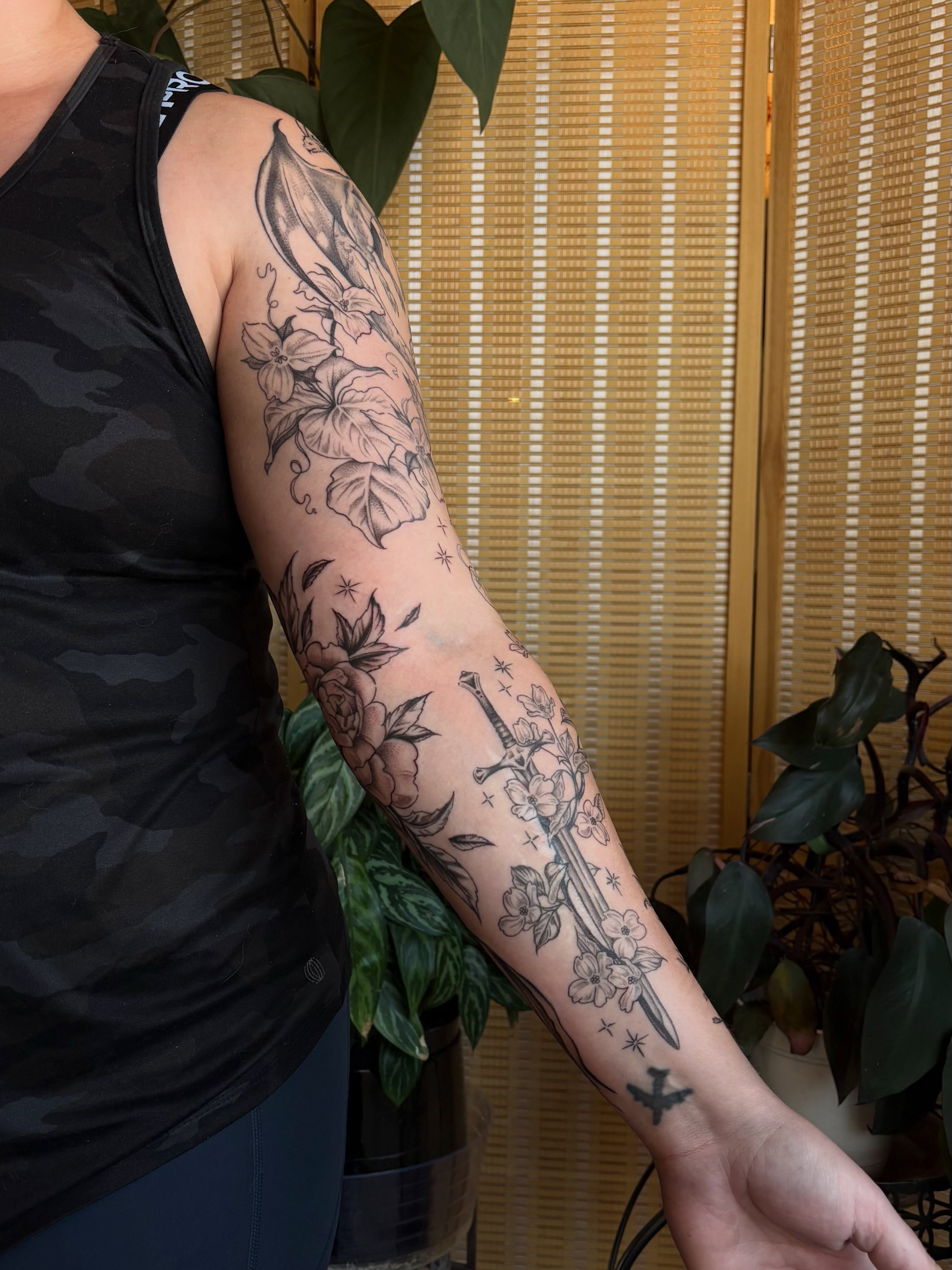 Floral and sword fine line tattoo on the forearm by emery ♡ slc utah tattoo artist