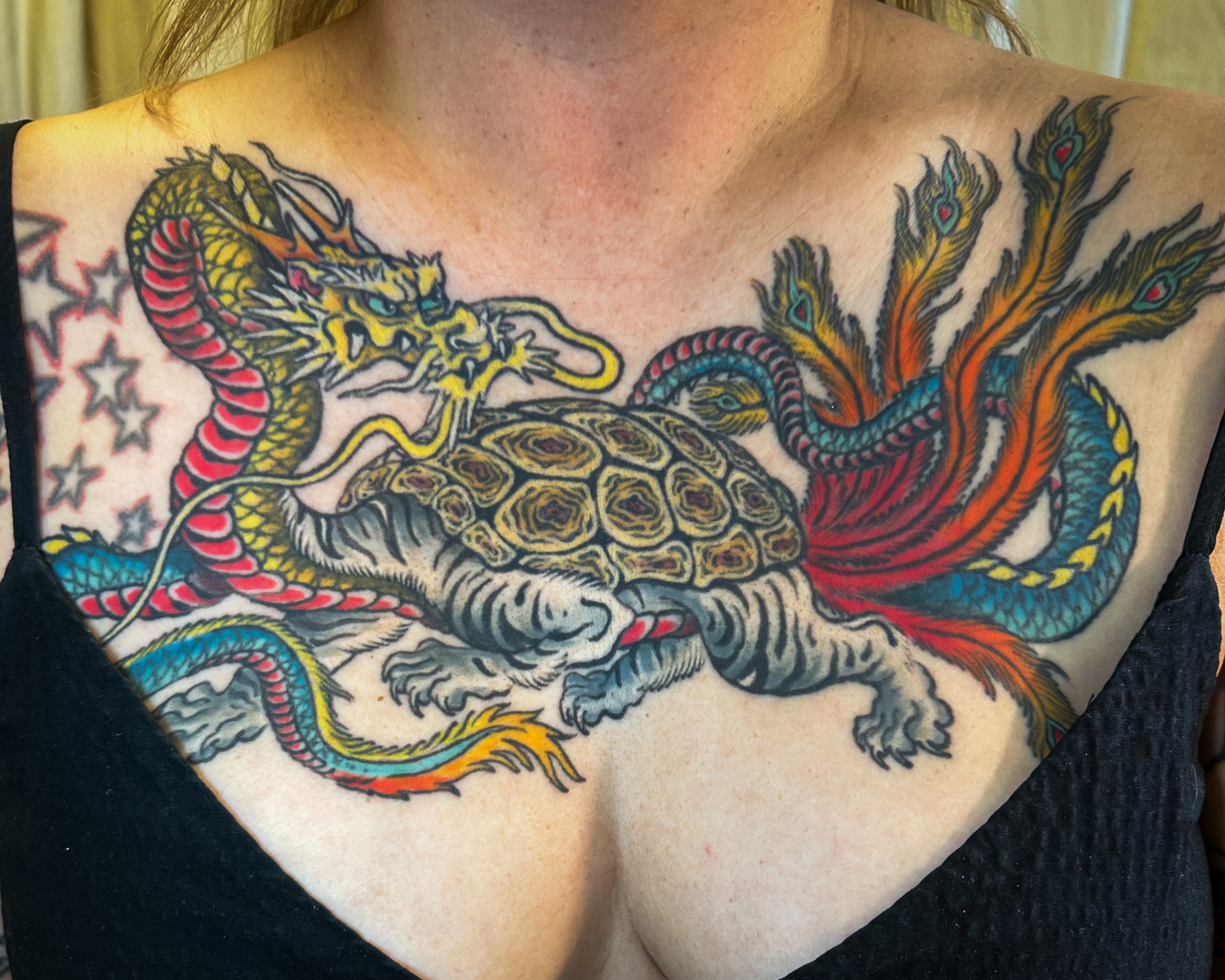 Dragon and turtle American traditional tattoo on the chest by Colin Kenji Baker, San Jose, California