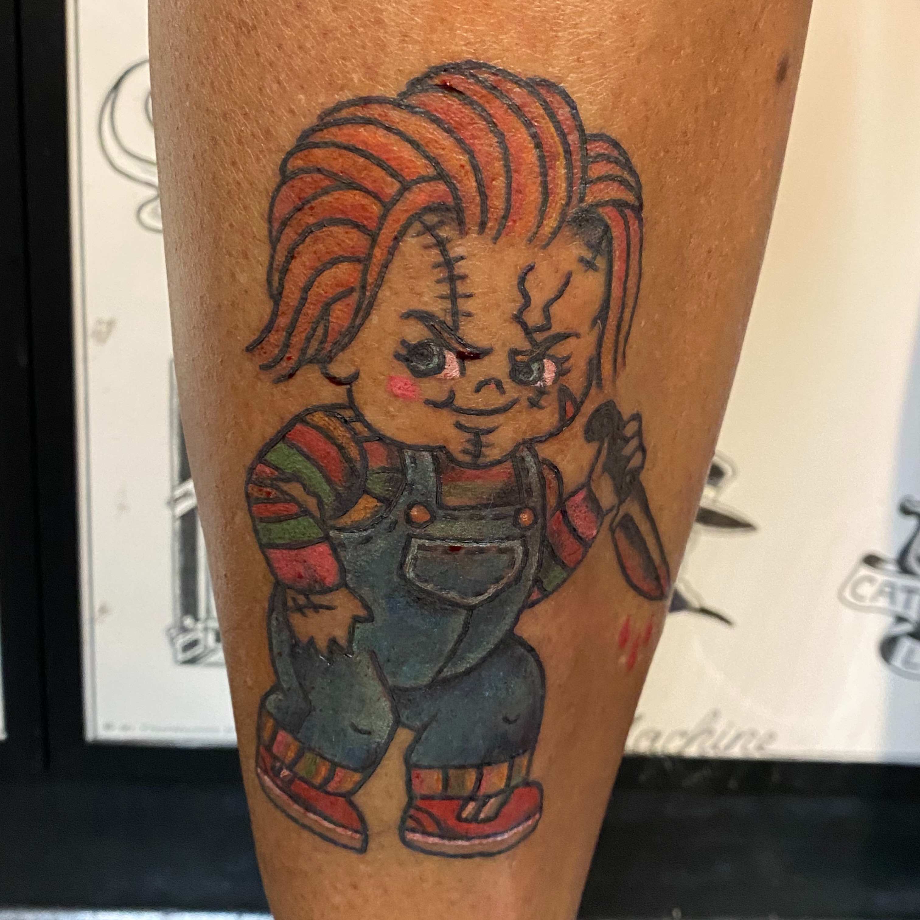 Chucky doll American traditional tattoo on the forearm by Las Vegas Tattoo Artist