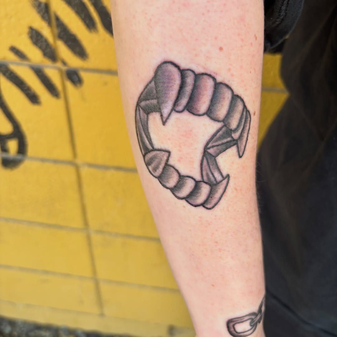 Fist American traditional tattoo on the forearm by Las Vegas Tattoo Artist