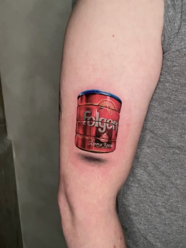 Folgers coffee can realism tattoo on the forearm by Aren