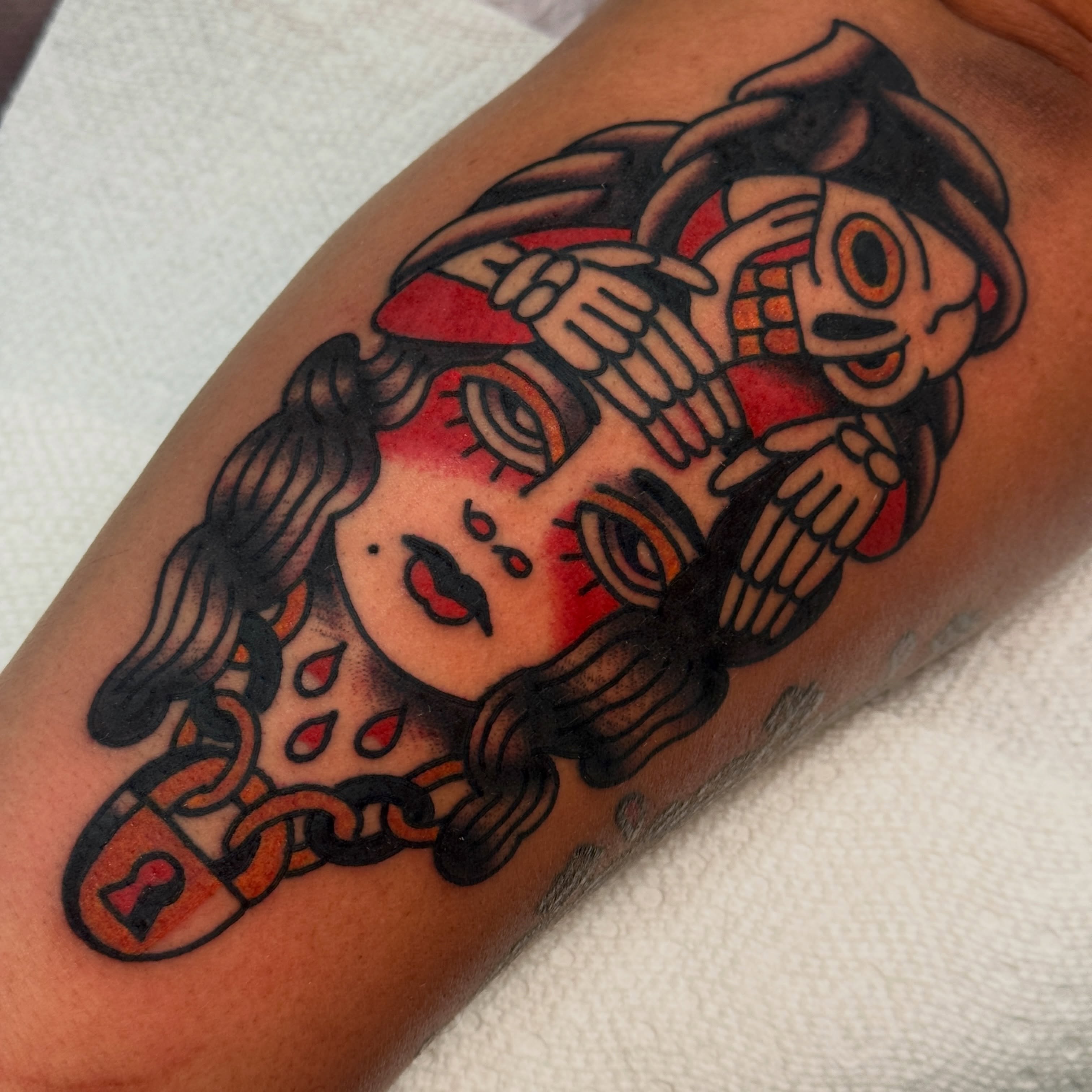 Woman with skeleton American traditional tattoo on the forearm by Rafael Torres, San Francisco, California