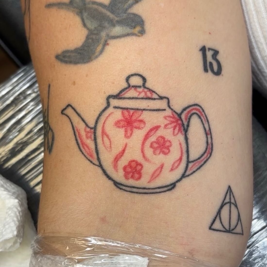 Teapot American traditional tattoo on the forearm by Molly Dixon