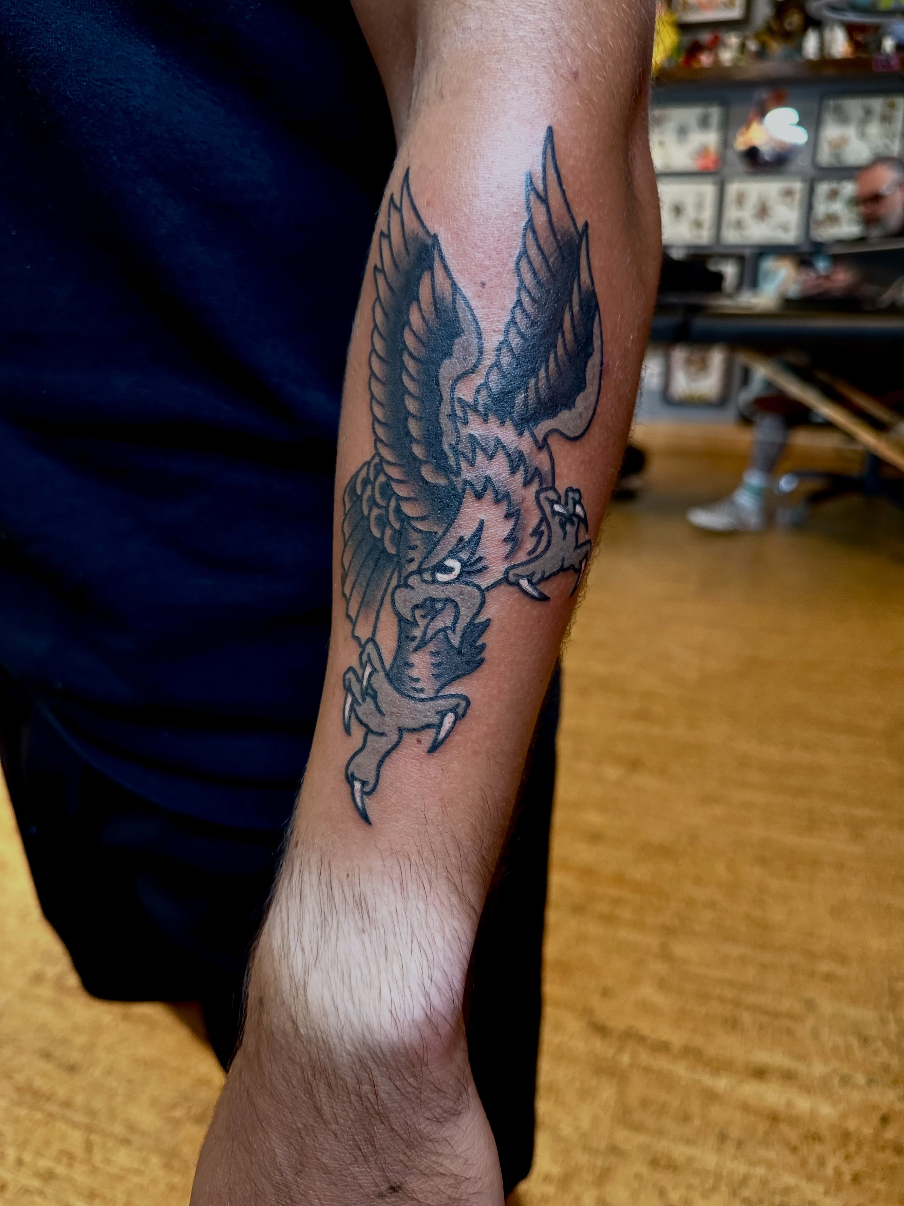 Dragon American traditional tattoo on the forearm by teddy, Portland, Oregon