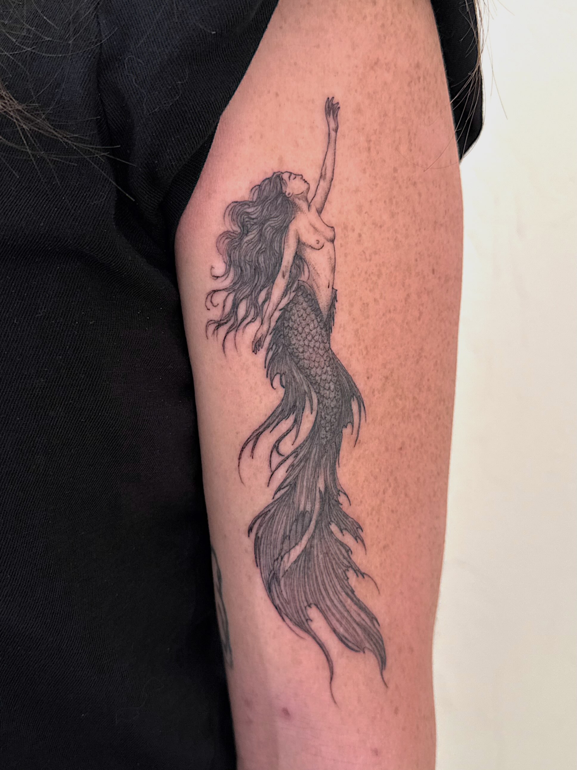 Mermaid black and grey tattoo on the forearm by Shelby Lynn Bayles, Ogden, Utah