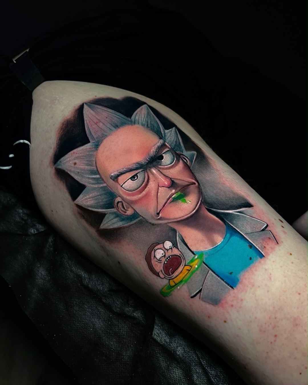 Rick and morty realism tattoo on the forearm by Edward best