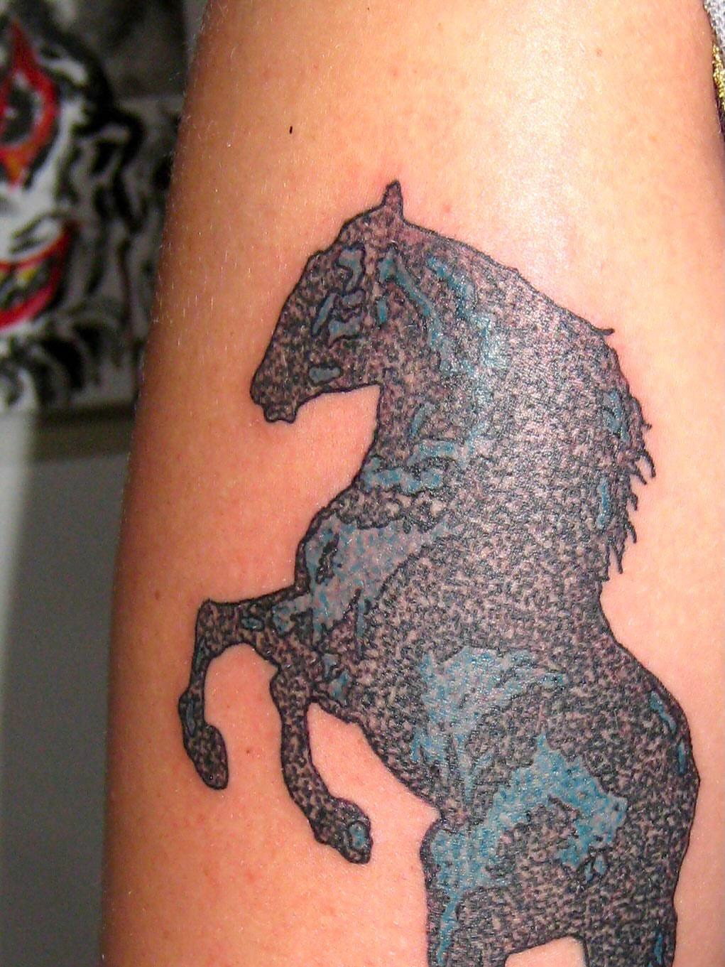 Horse dotwork tattoo on the forearm by jonatan