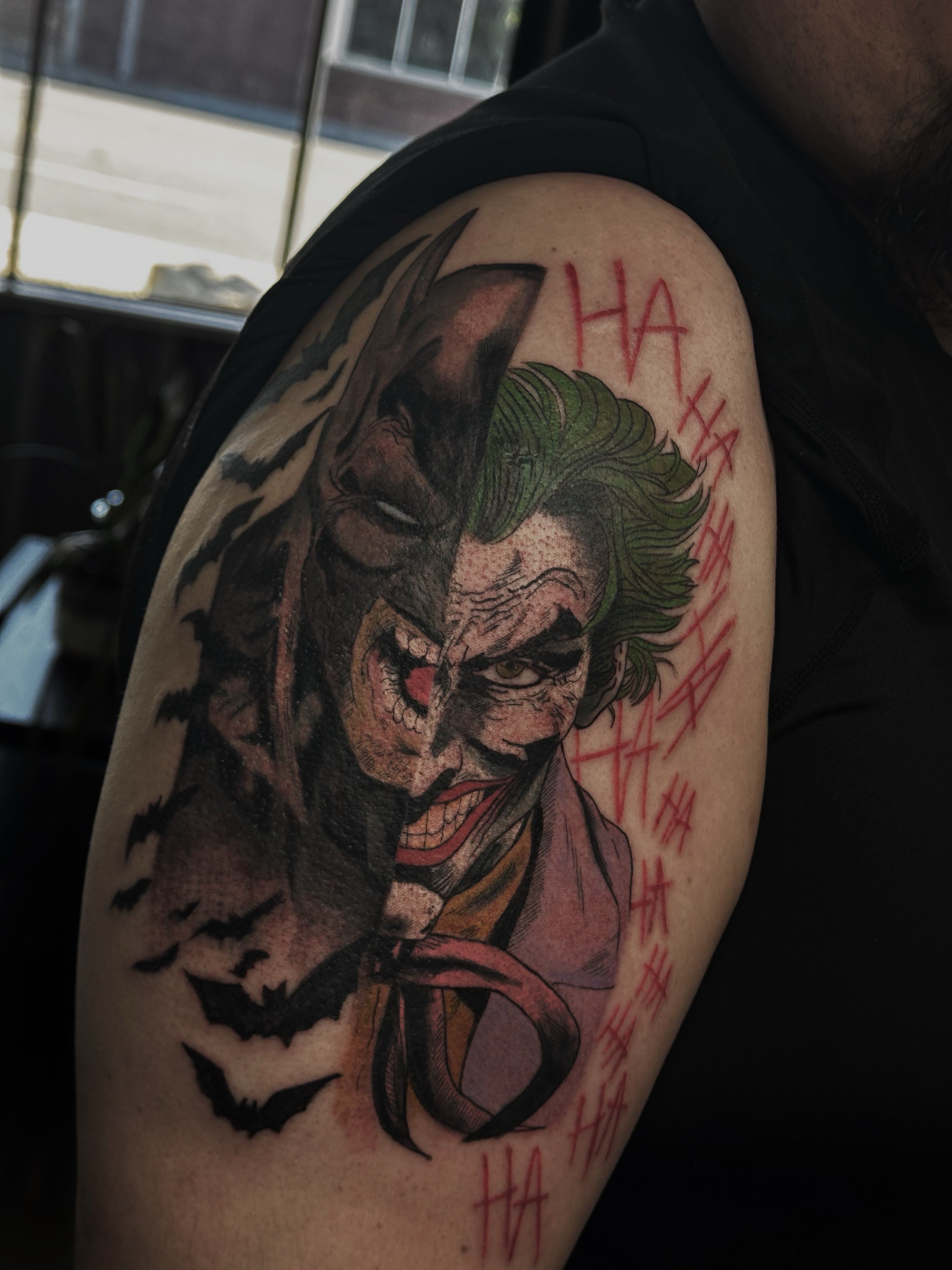 Joker realism tattoo on the shoulder by Marly Quinn