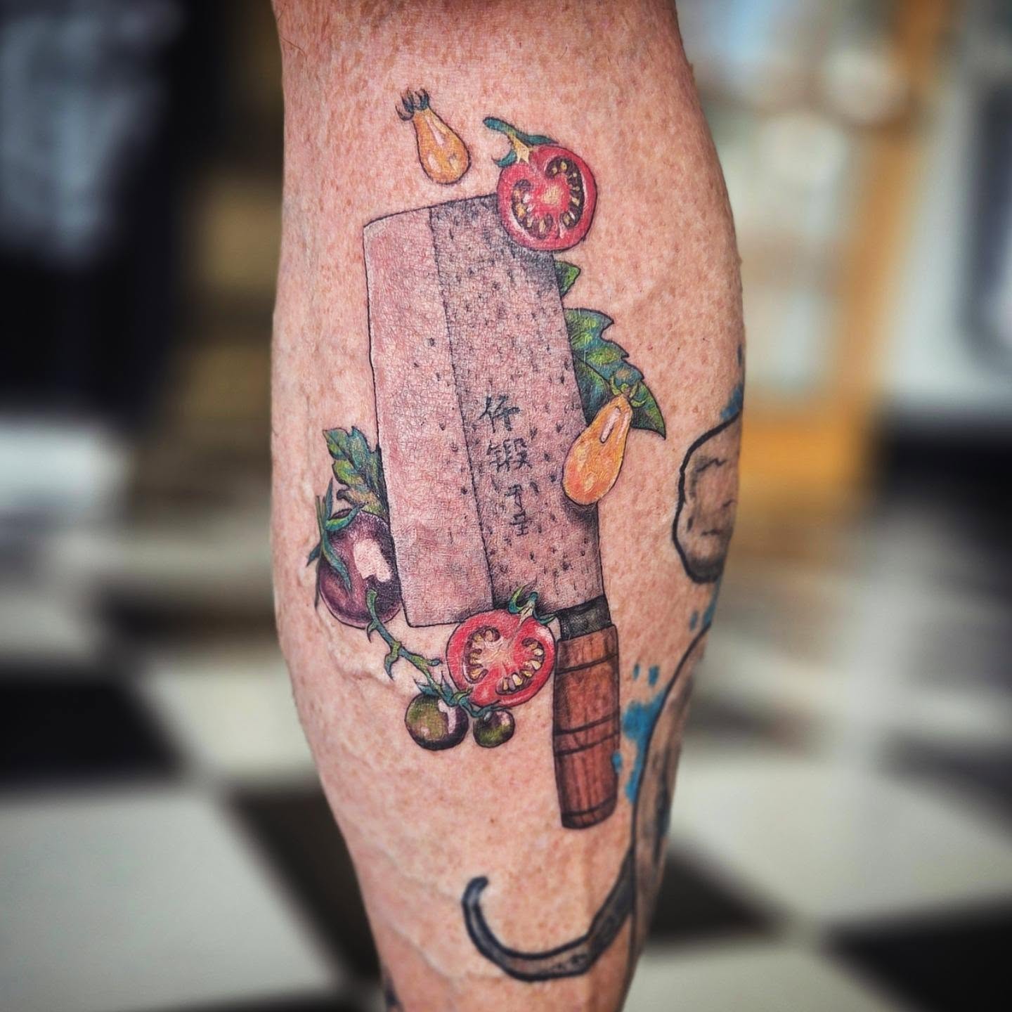 Knife and vegetables dotwork tattoo on the forearm by Molly DeSmedt