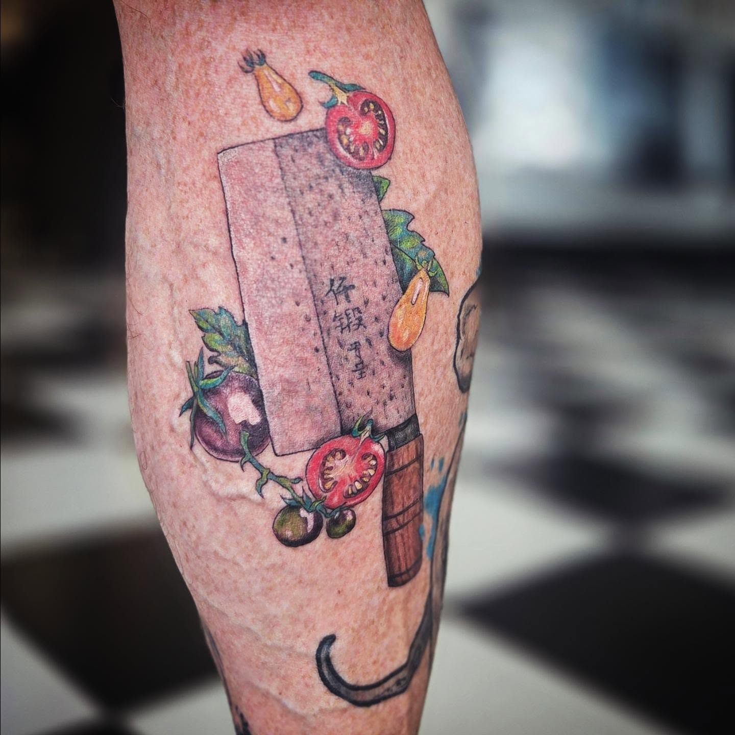 Vegetables and knife dotwork tattoo on the forearm by Molly DeSmedt
