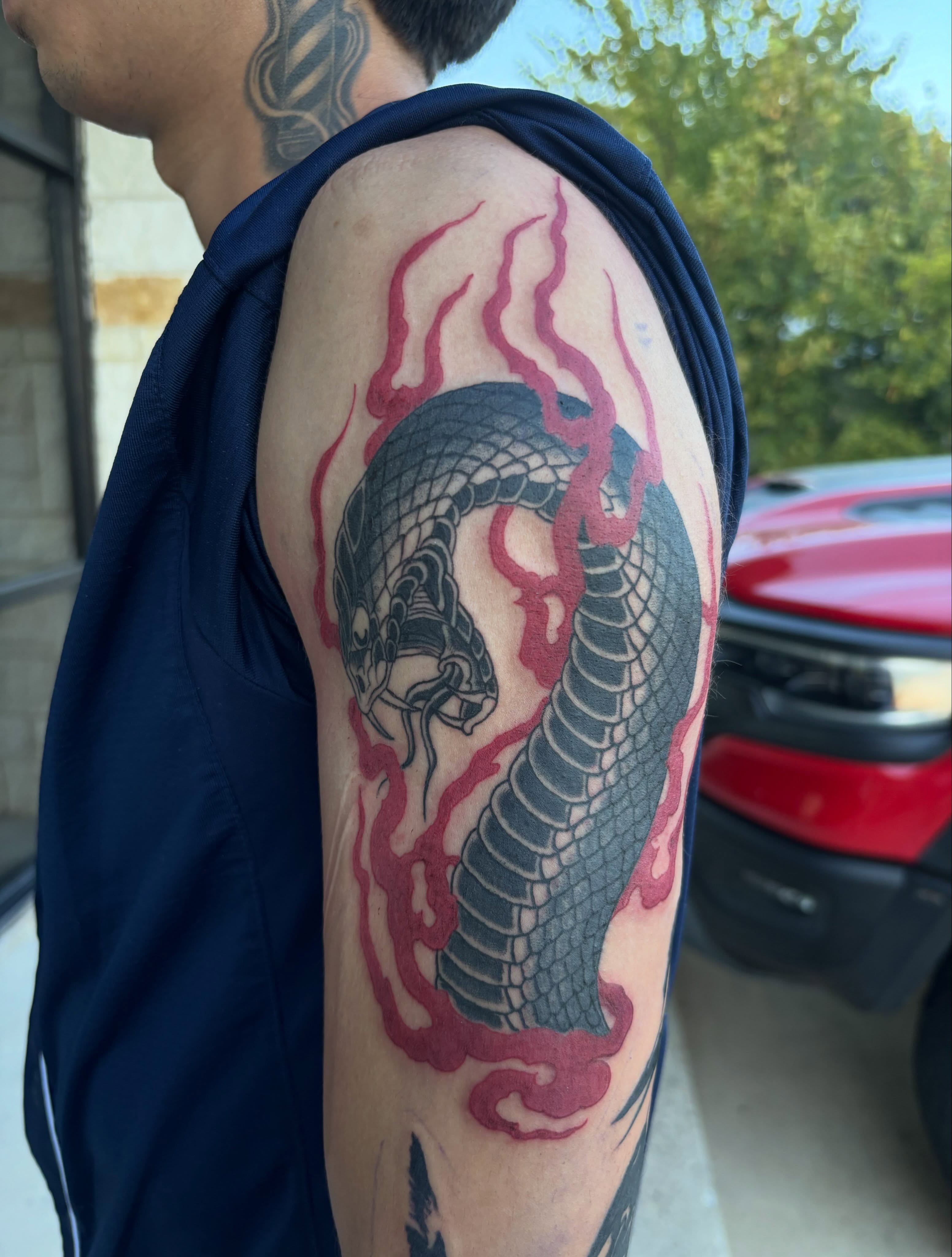Snake japanese irezumi tattoo on the upper arm by Ethan Ellis, Dallas, Texas
