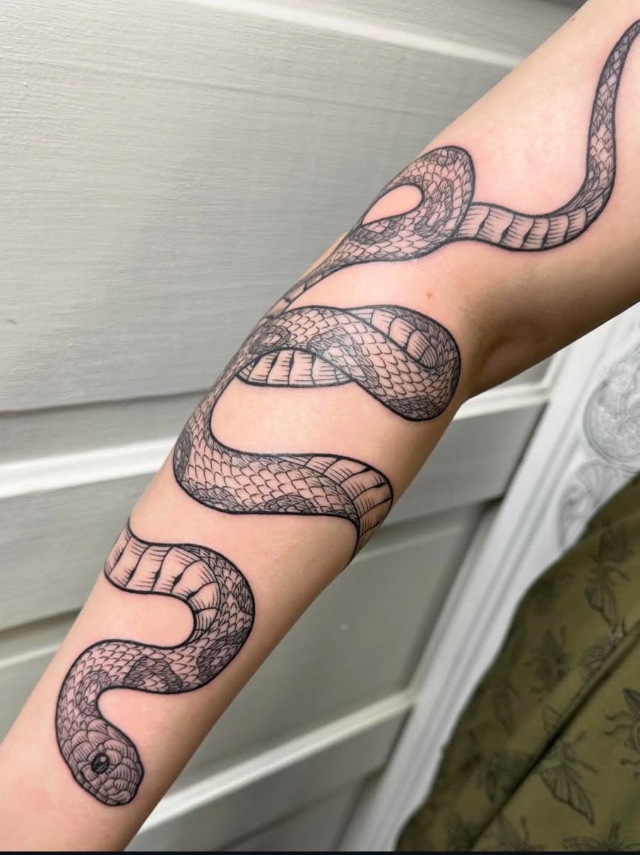 Snake black and grey tattoo on the forearm by Taylor 🍂☕️