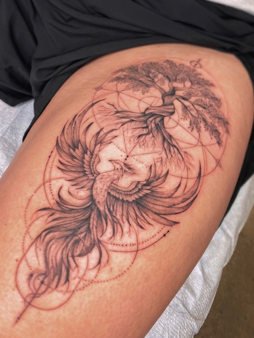Tree and bird realism tattoo on the thigh by Cody Mason