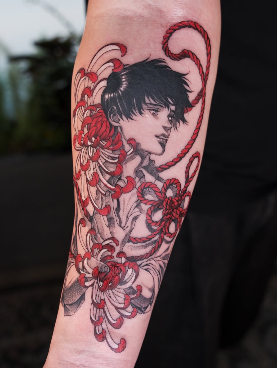 Anime character with chrysanthemums anime tattoo on the forearm by Hemi 혜미타투