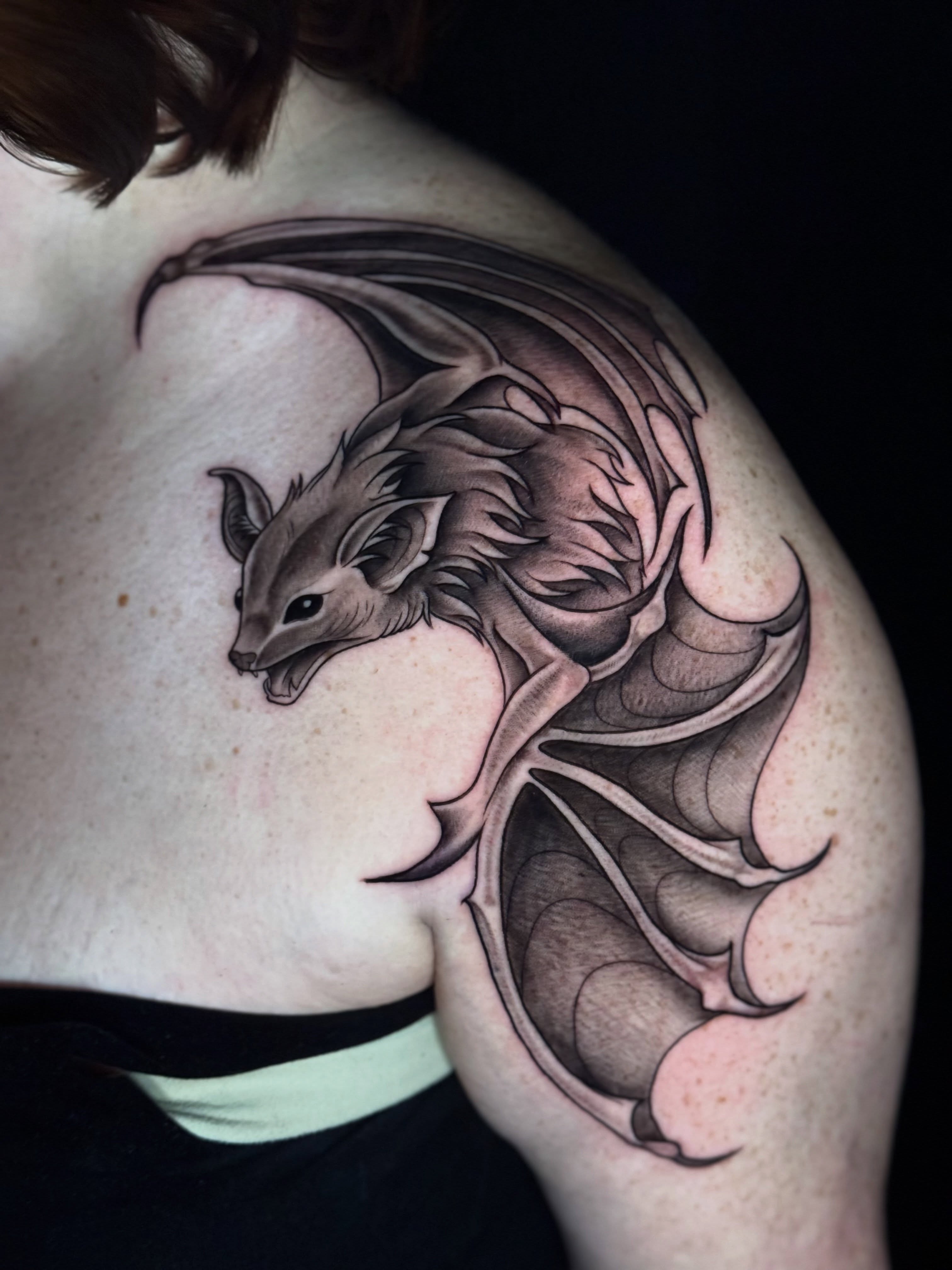Dragon black and grey tattoo on the shoulder by Lily Bejarno