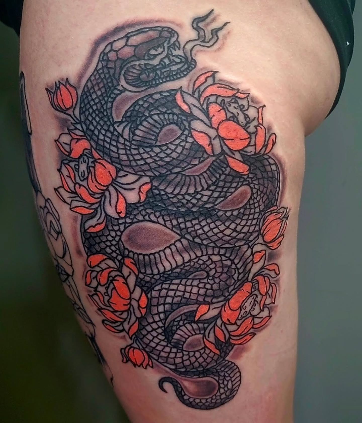Snake and flowers japanese irezumi tattoo on the thigh by Captain Michael Devious