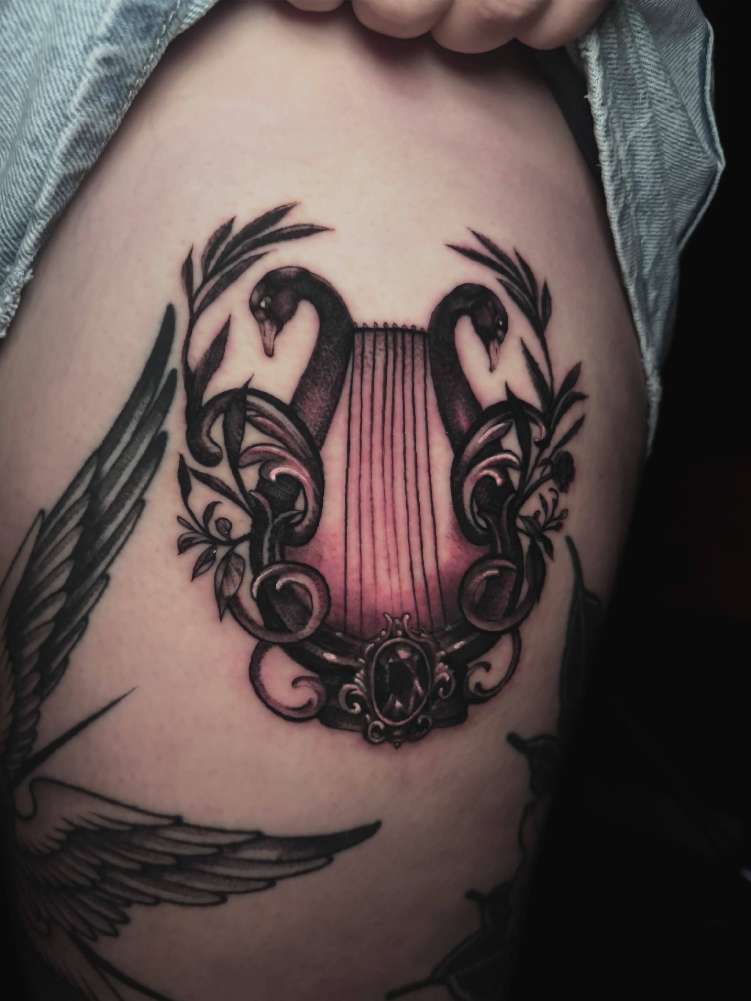 Lyre and swans ornamental tattoo by Alle