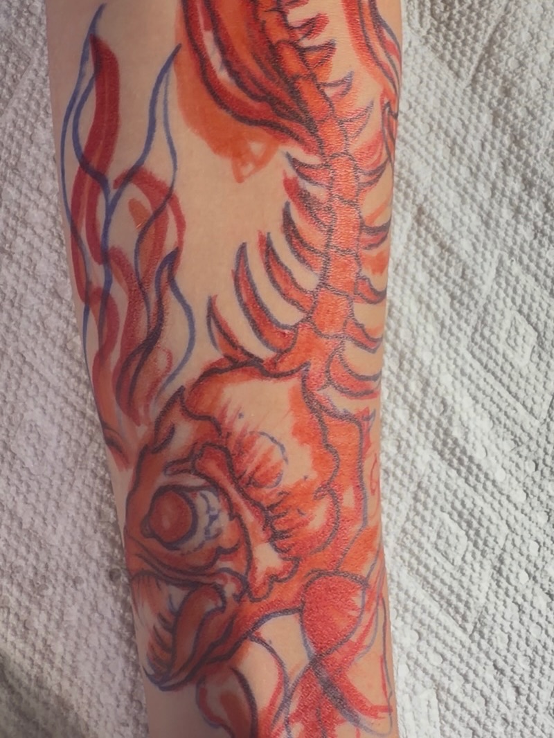 Fish American traditional tattoo on the forearm by Blue Horseshoe Tattoo & Body Piercing