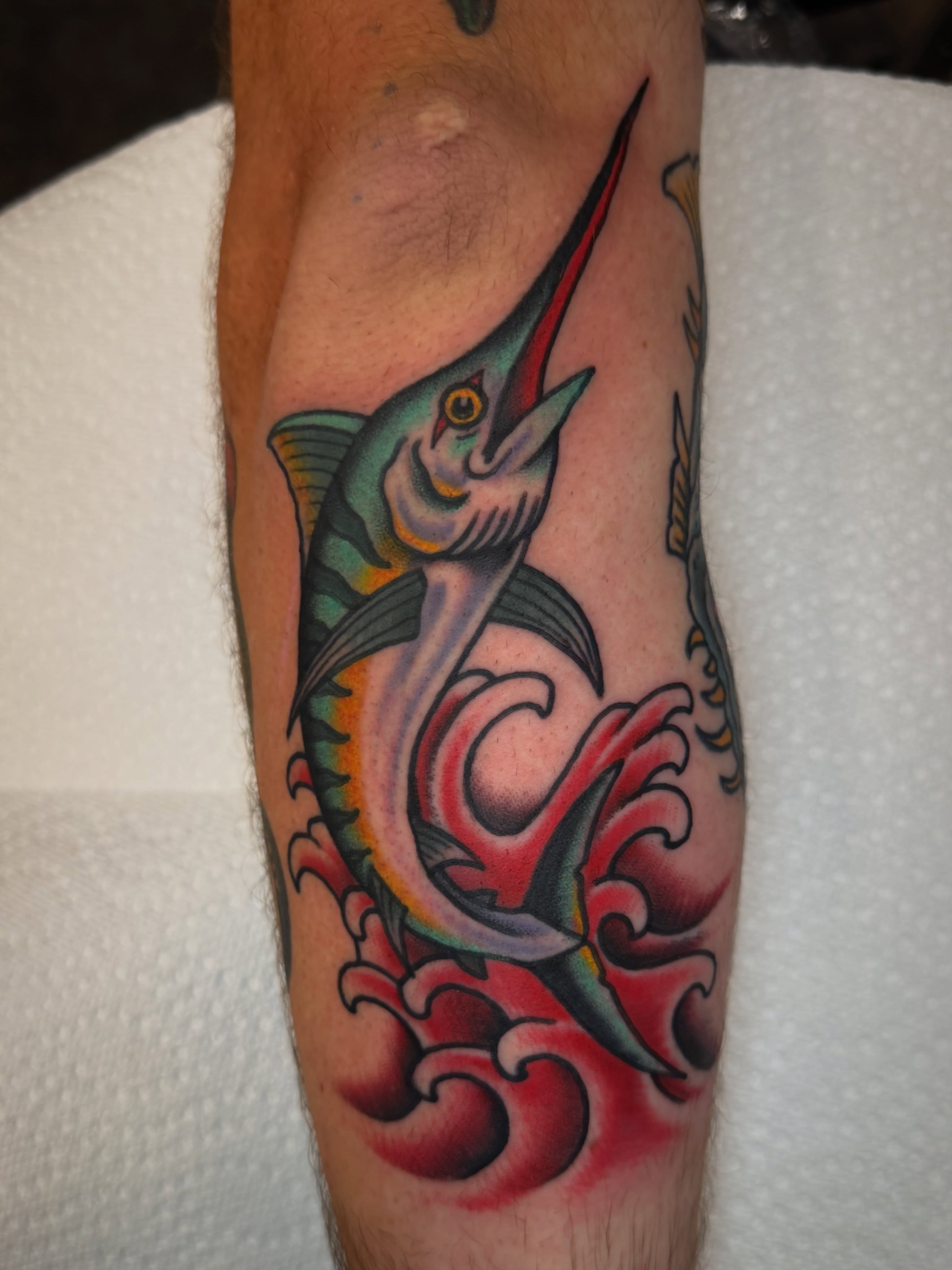 Marlin American traditional tattoo on the forearm by Christopher Mikesell
