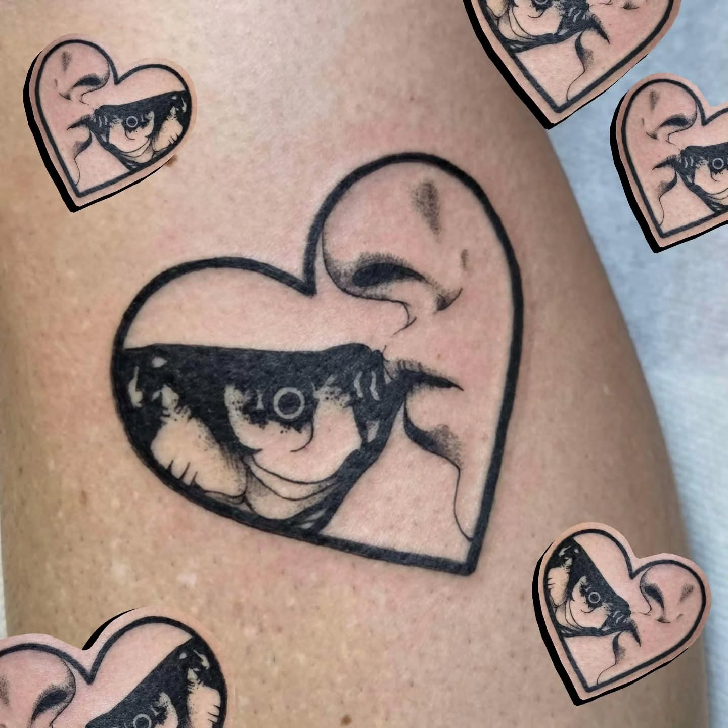 Heart with fish black and grey tattoo on the forearm by alec