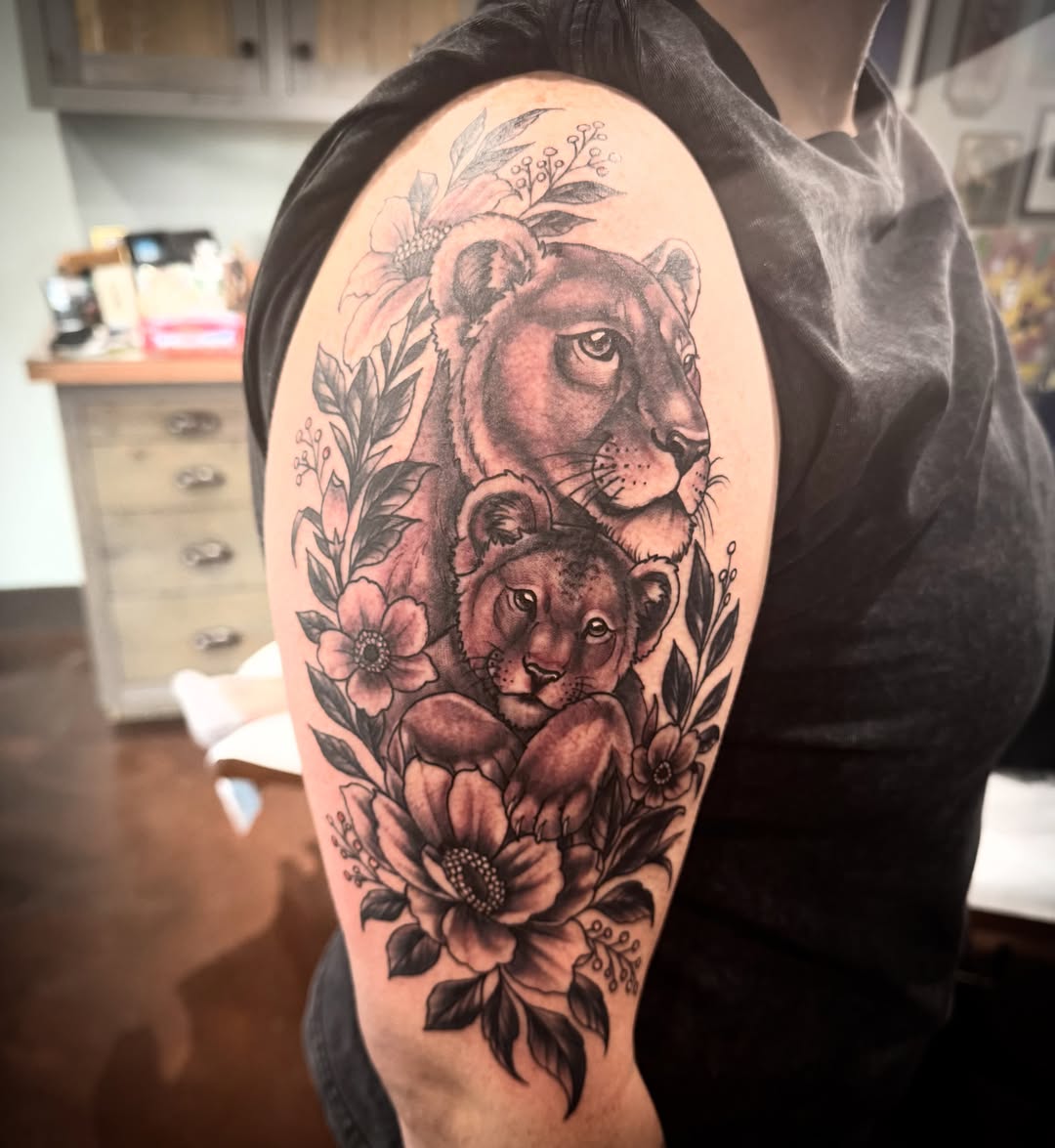 Lioness and cub realism tattoo on the shoulder by Cory Haberman