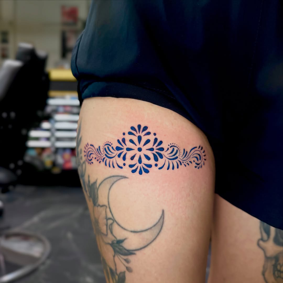 Floral mandala geometric tattoo on the thigh by Barbara Gonzalez
