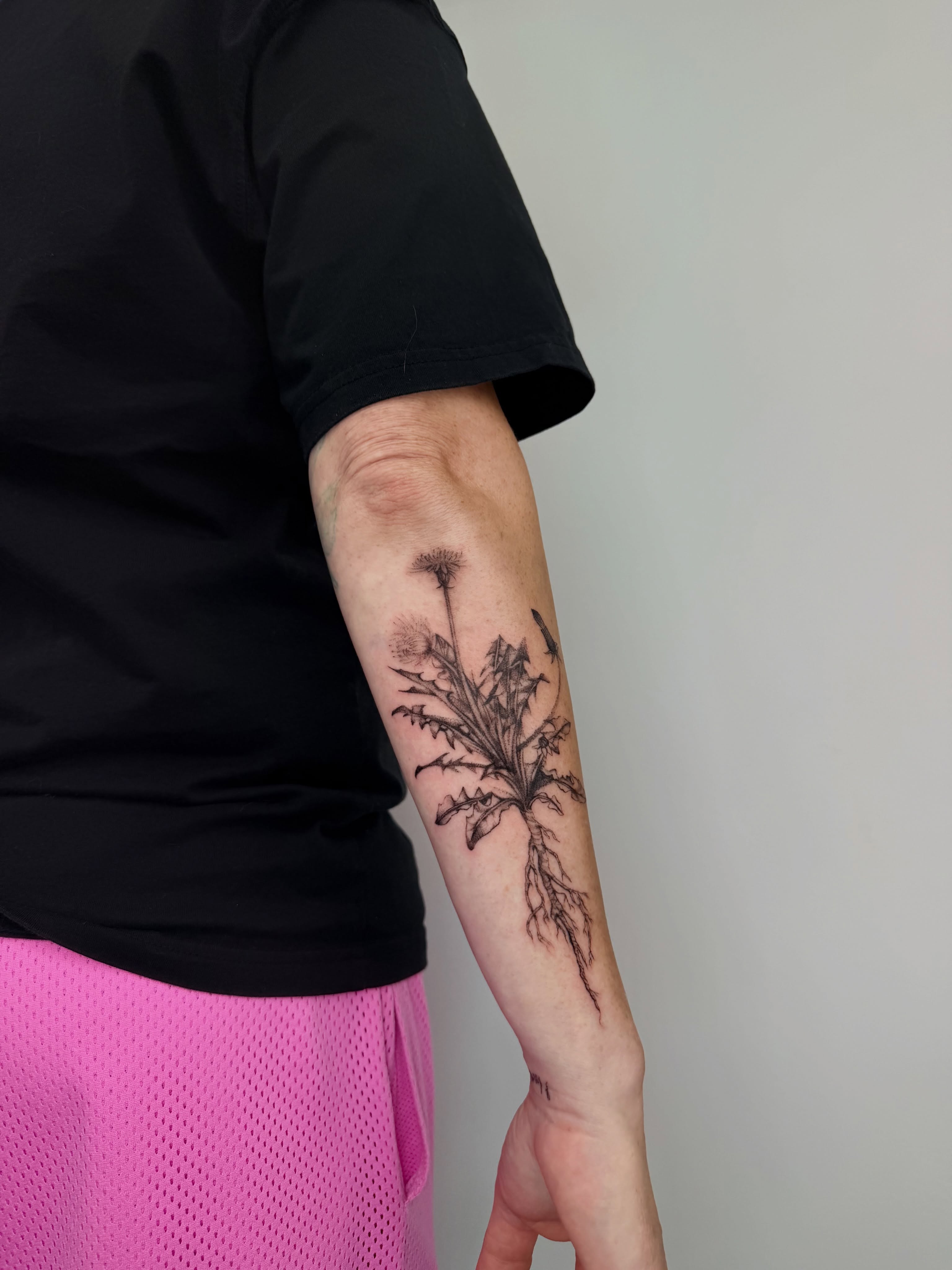 Dandelion black and grey tattoo on the forearm by bella :)