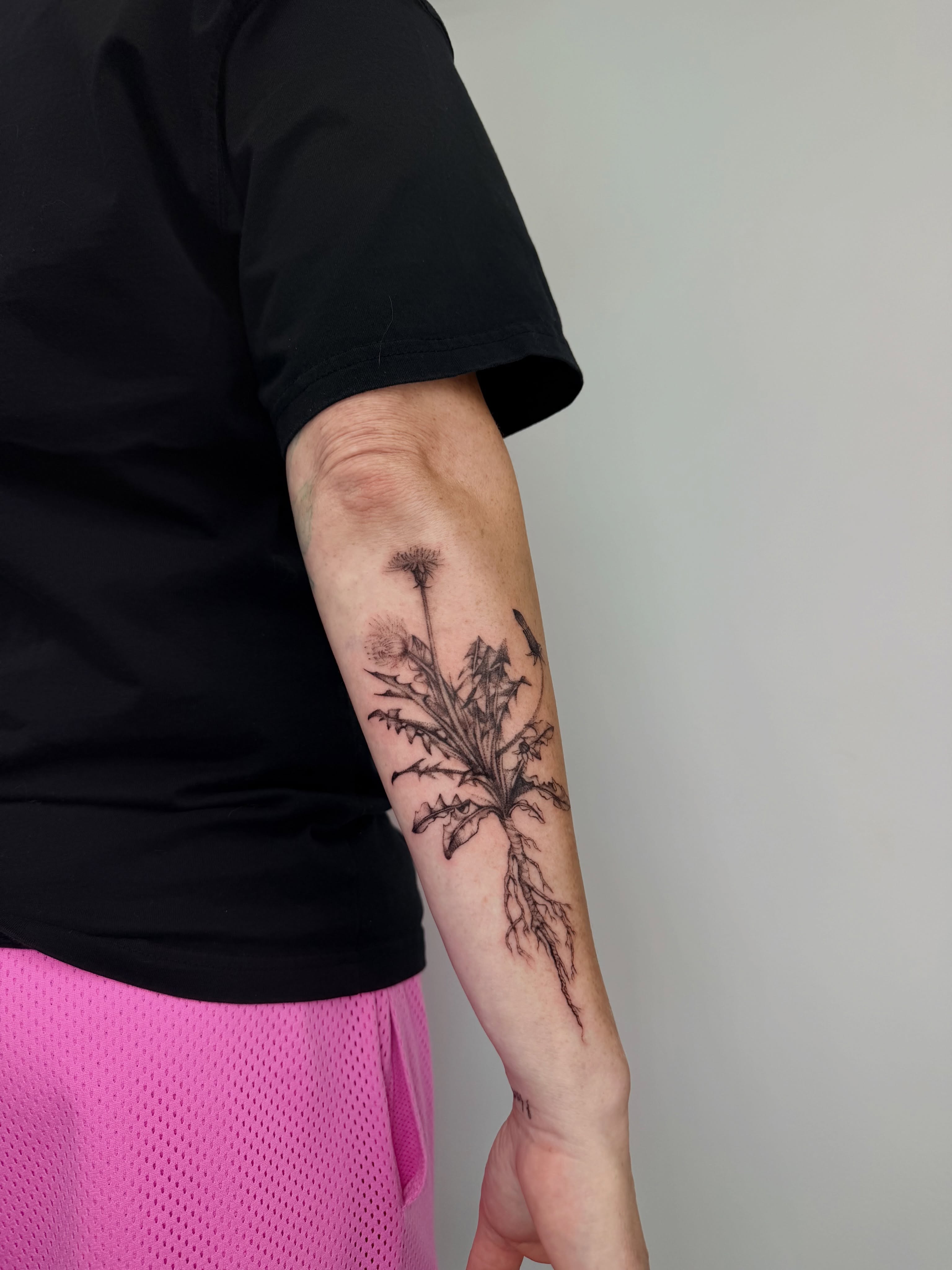 Dandelion black and grey tattoo on the forearm by bella :)
