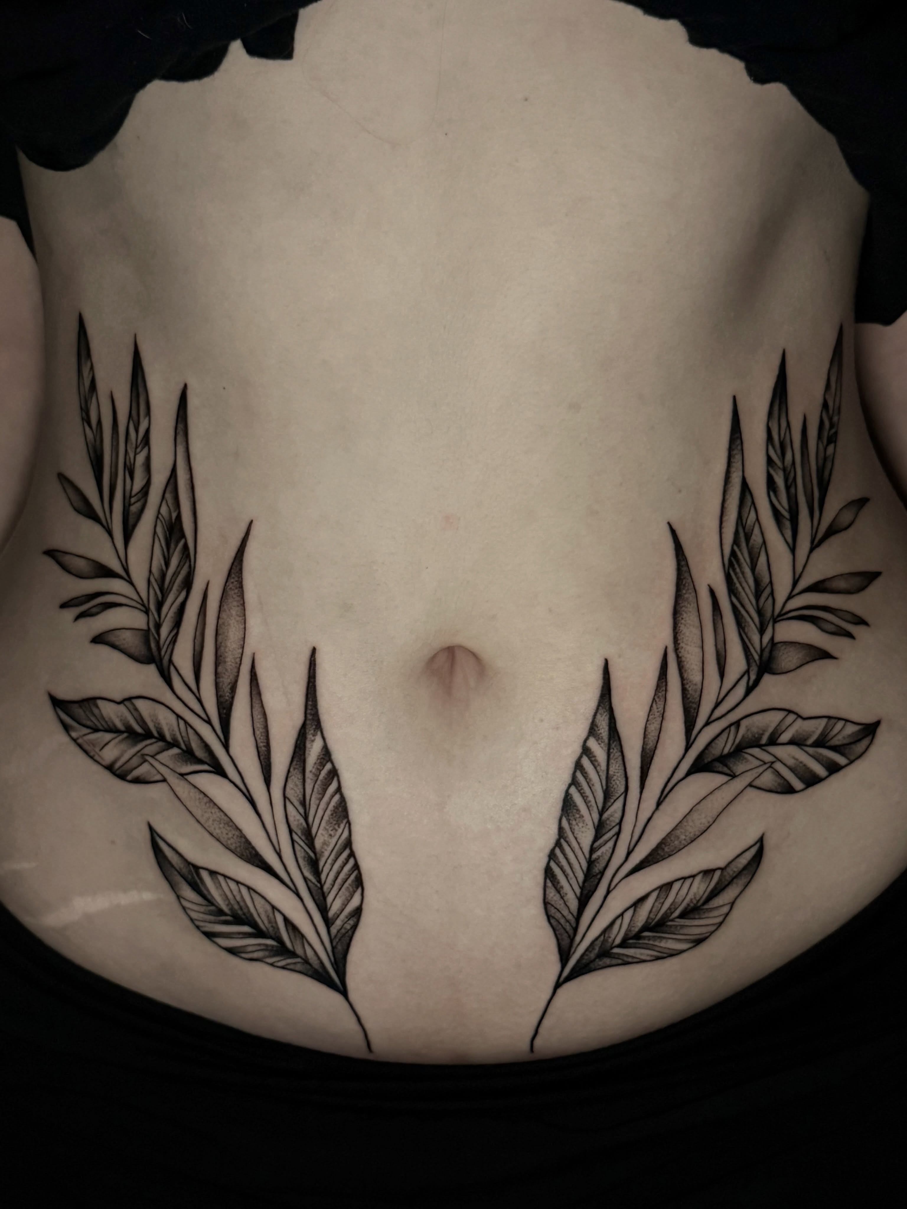 Foliage black and grey tattoo on the torso by Exploitedtattoos