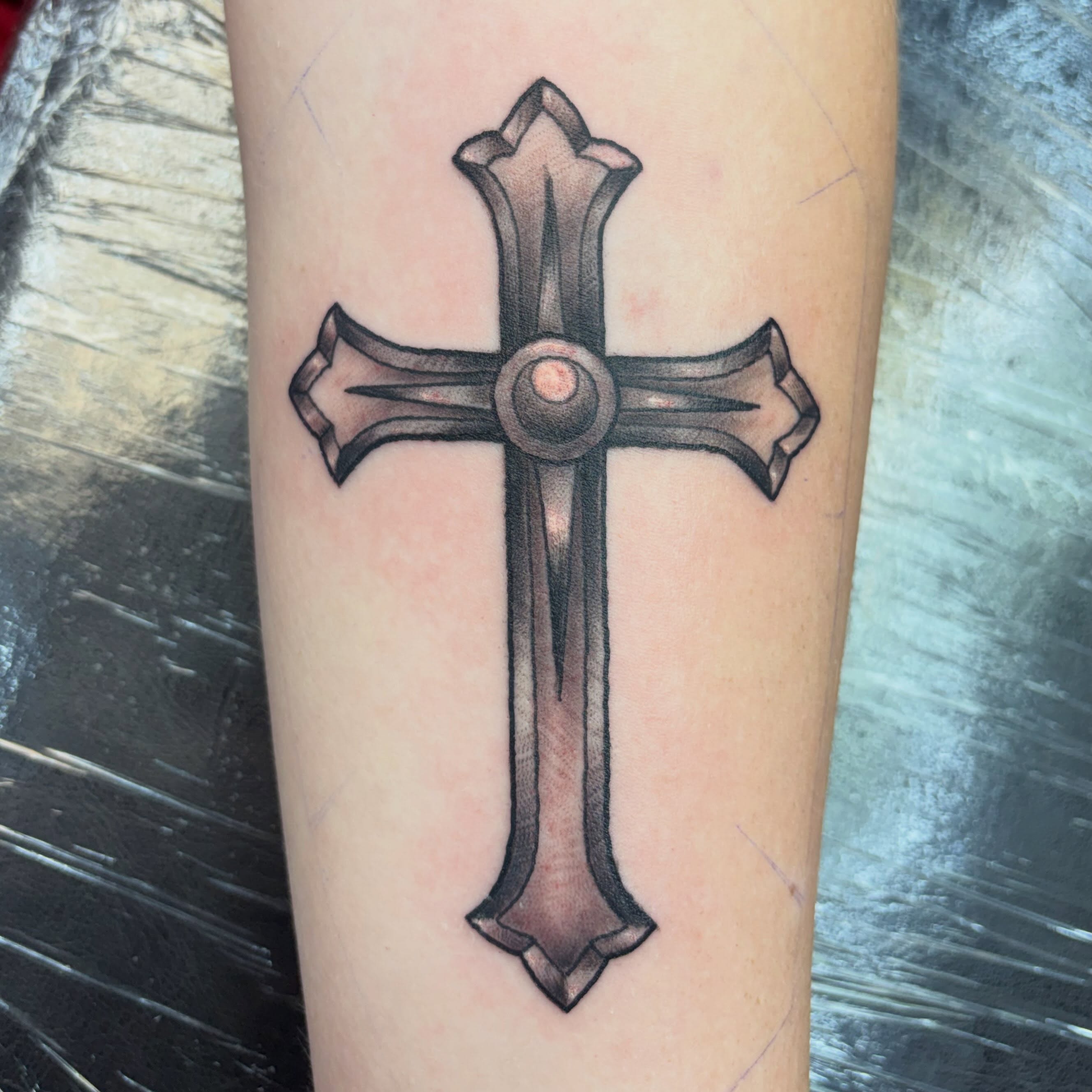 Cross black and grey tattoo on the forearm by Sam Hearnen, Lawrence, Kansas