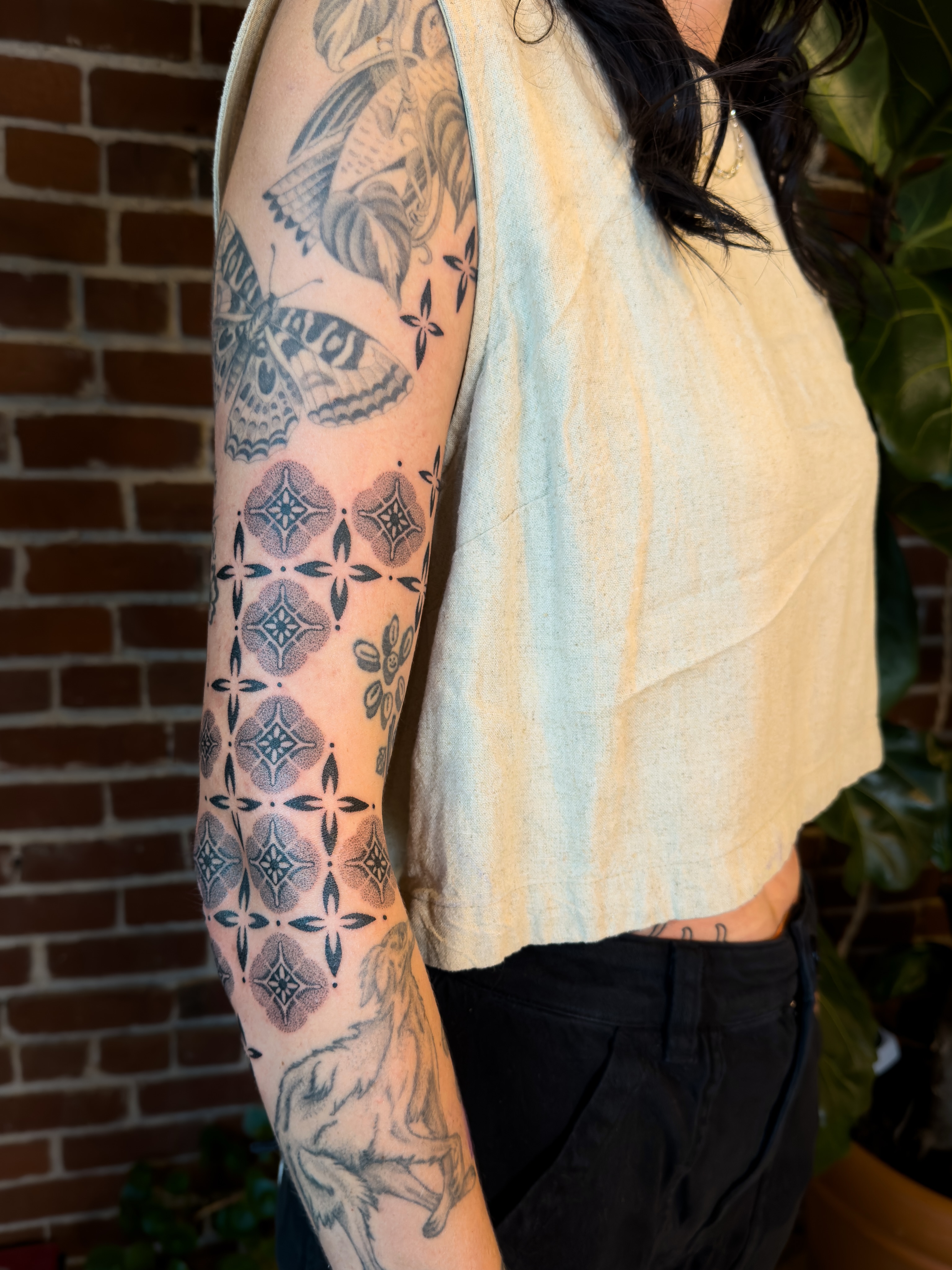 Geometric pattern dotwork tattoo on the forearm by Alexandra Gray