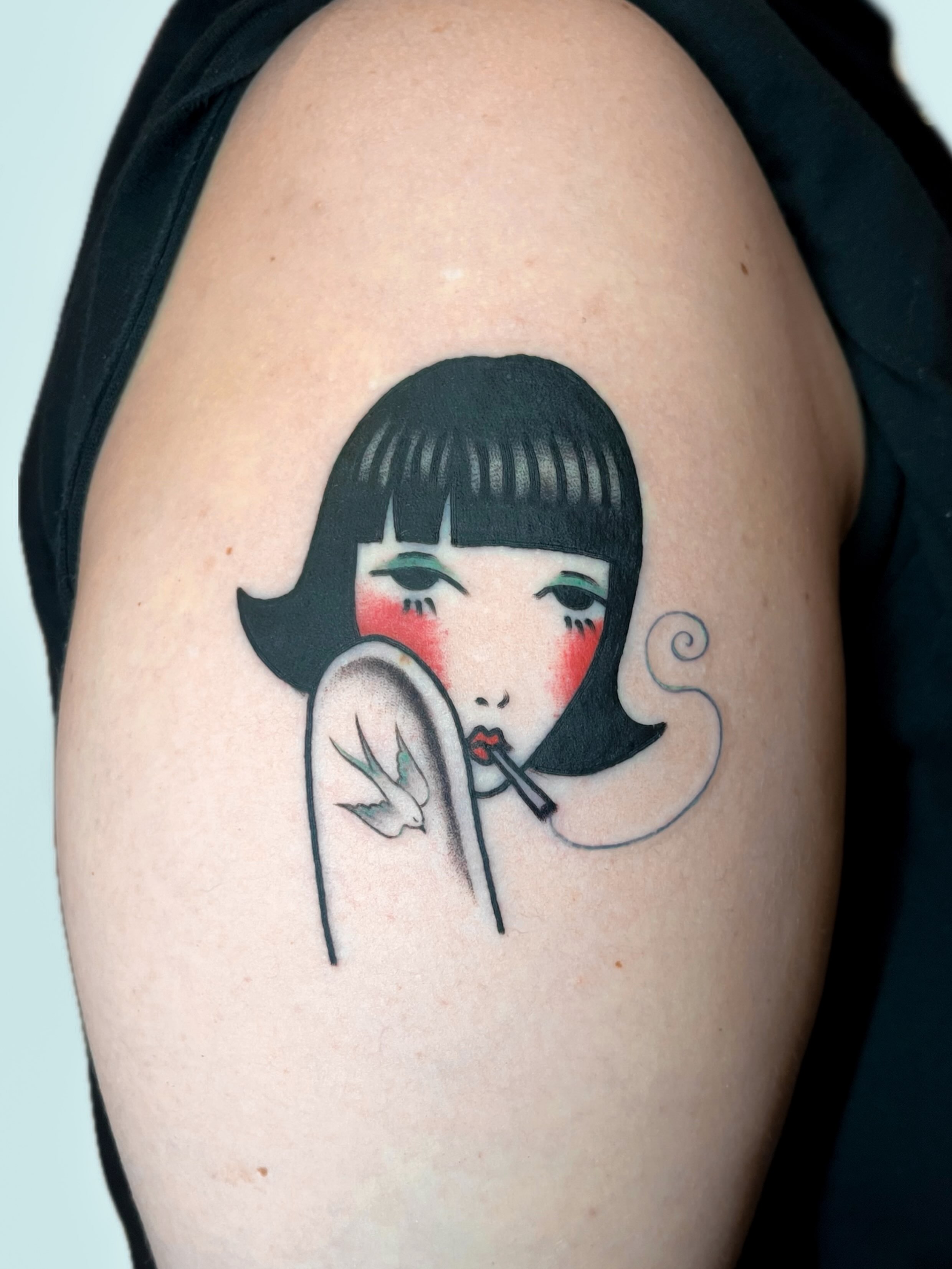 Woman smoking anime tattoo on the shoulder by nina