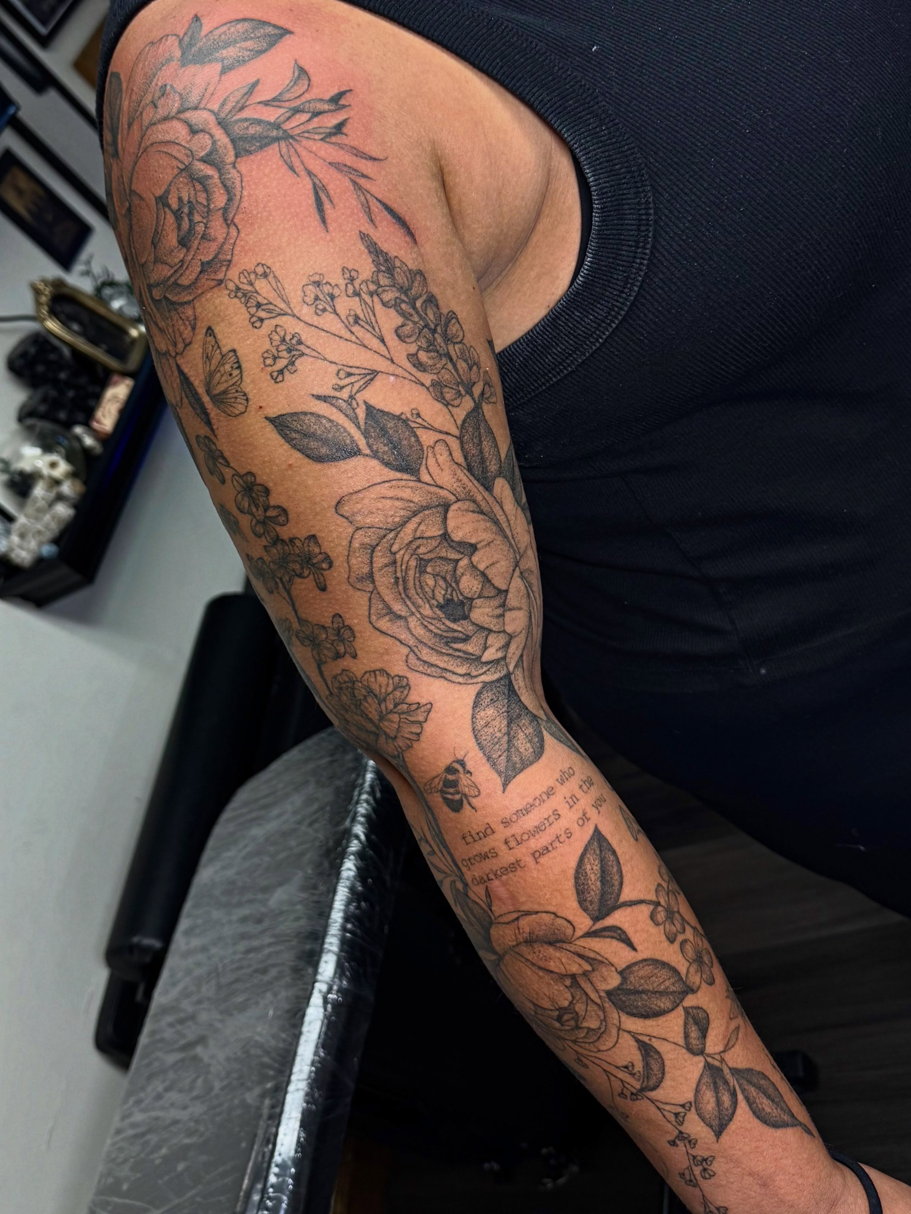 Floral bouquet black and grey tattoo on the forearm by βπ¬π―π’πΆ