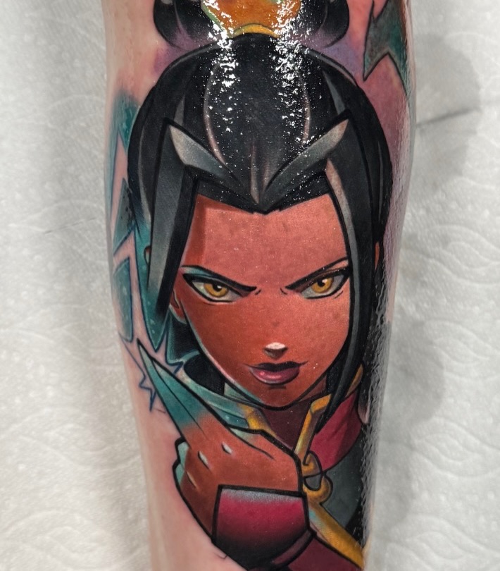 Anime character anime tattoo on the forearm by Jake lyon