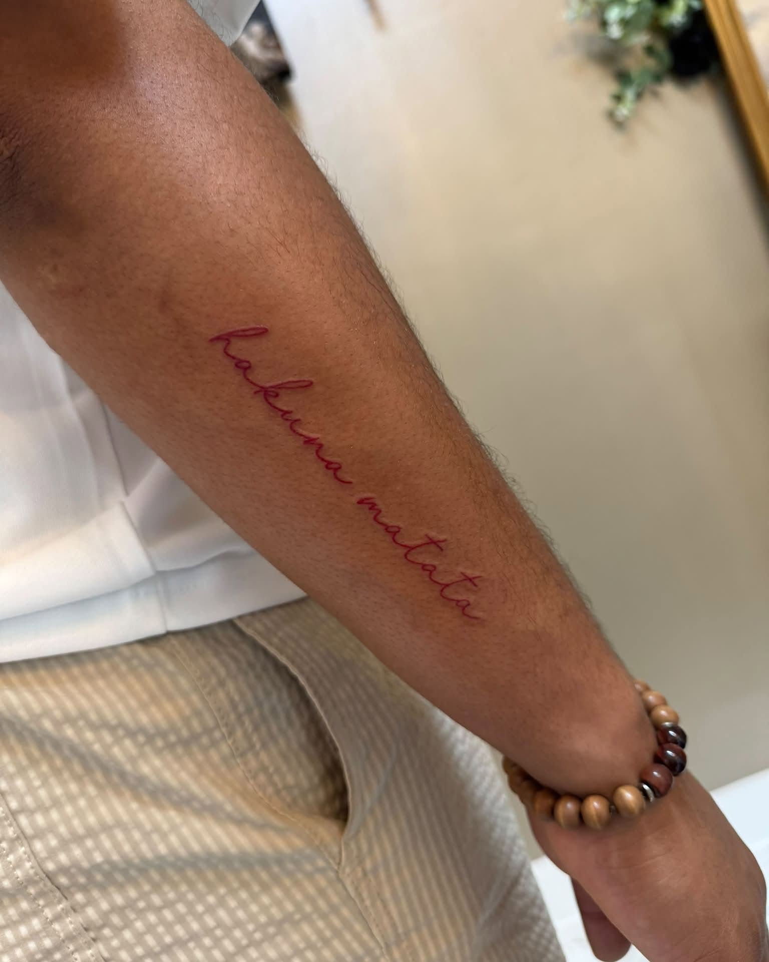 Tattoo by @justinrednourtattoo — lettering_script