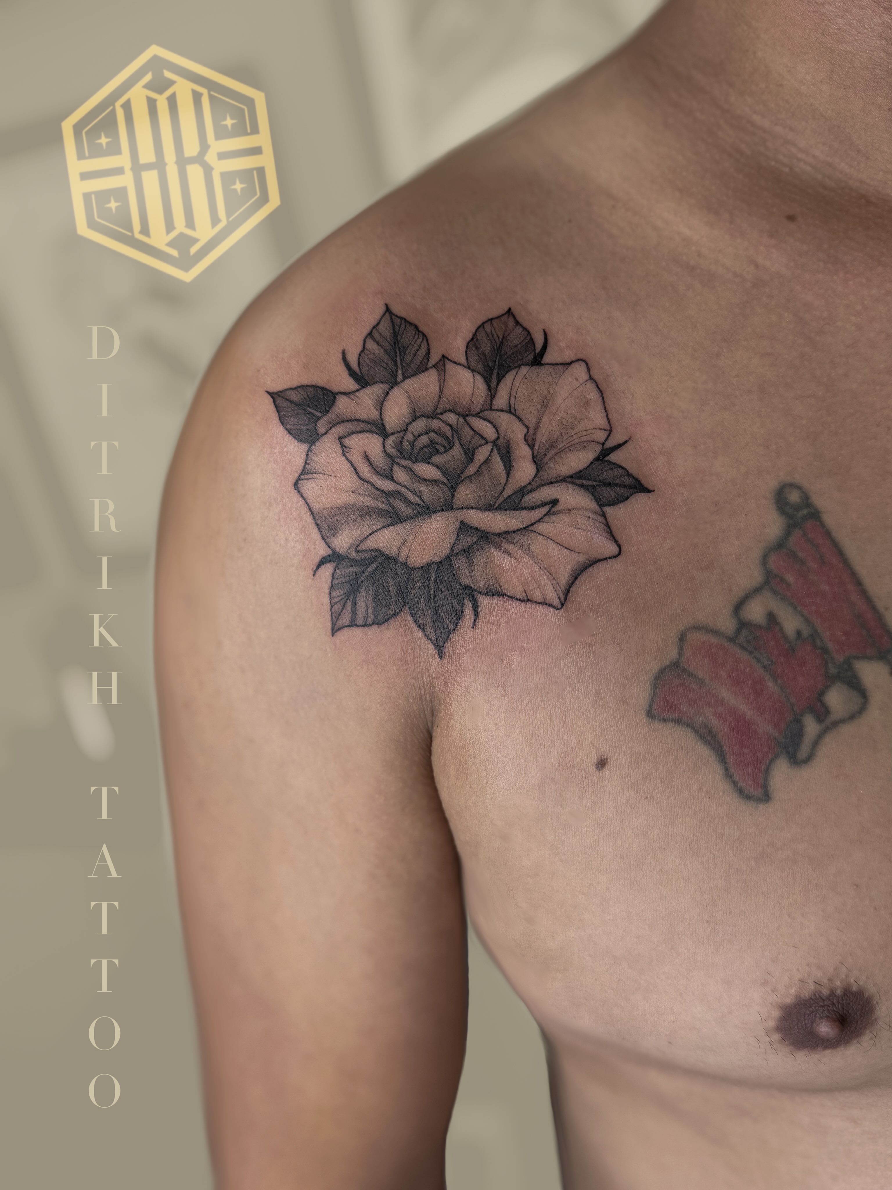 Rose black and grey tattoo on the shoulder by KET, Calgary, Alberta