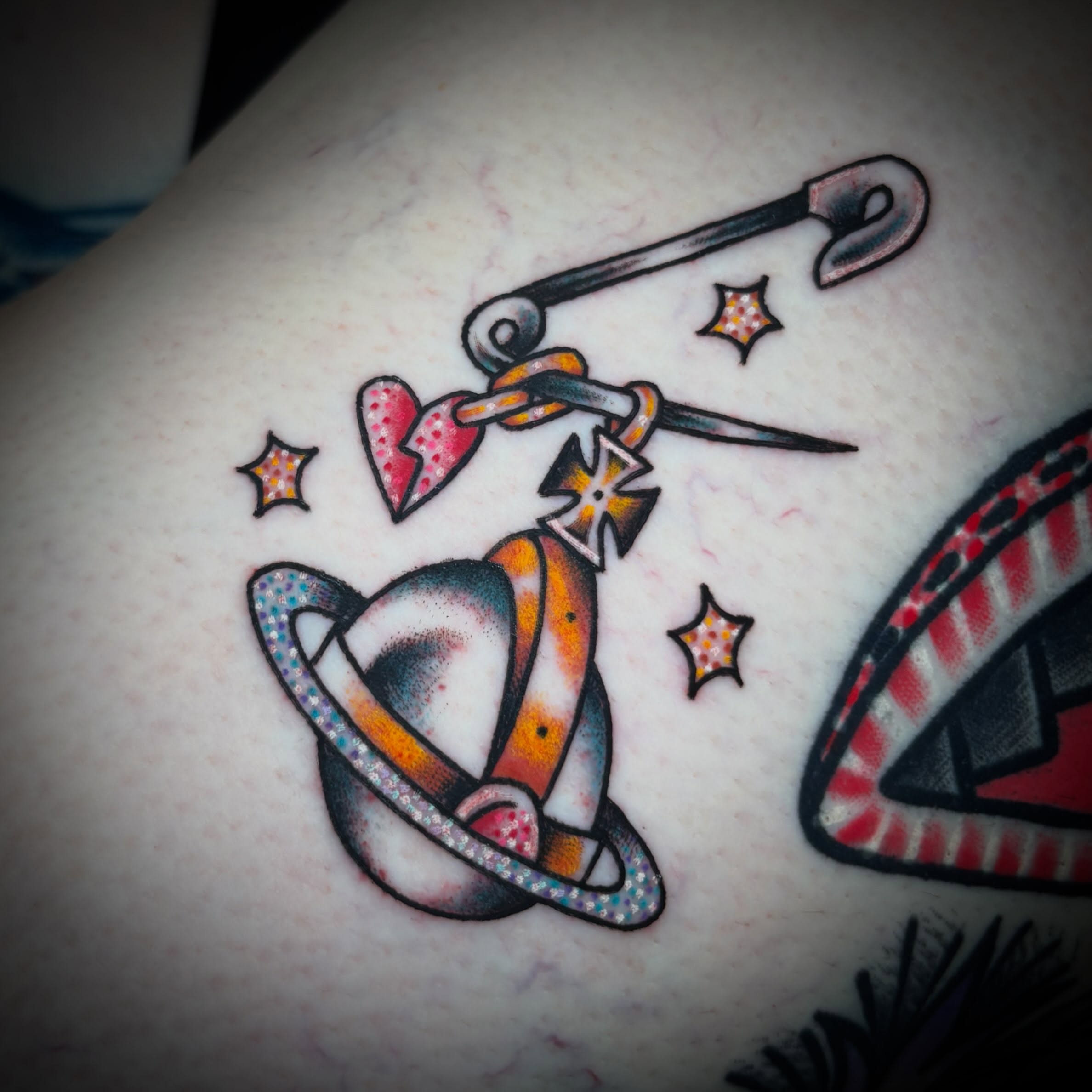 Space-themed tattoo American traditional tattoo on the upper arm by ππππππππ