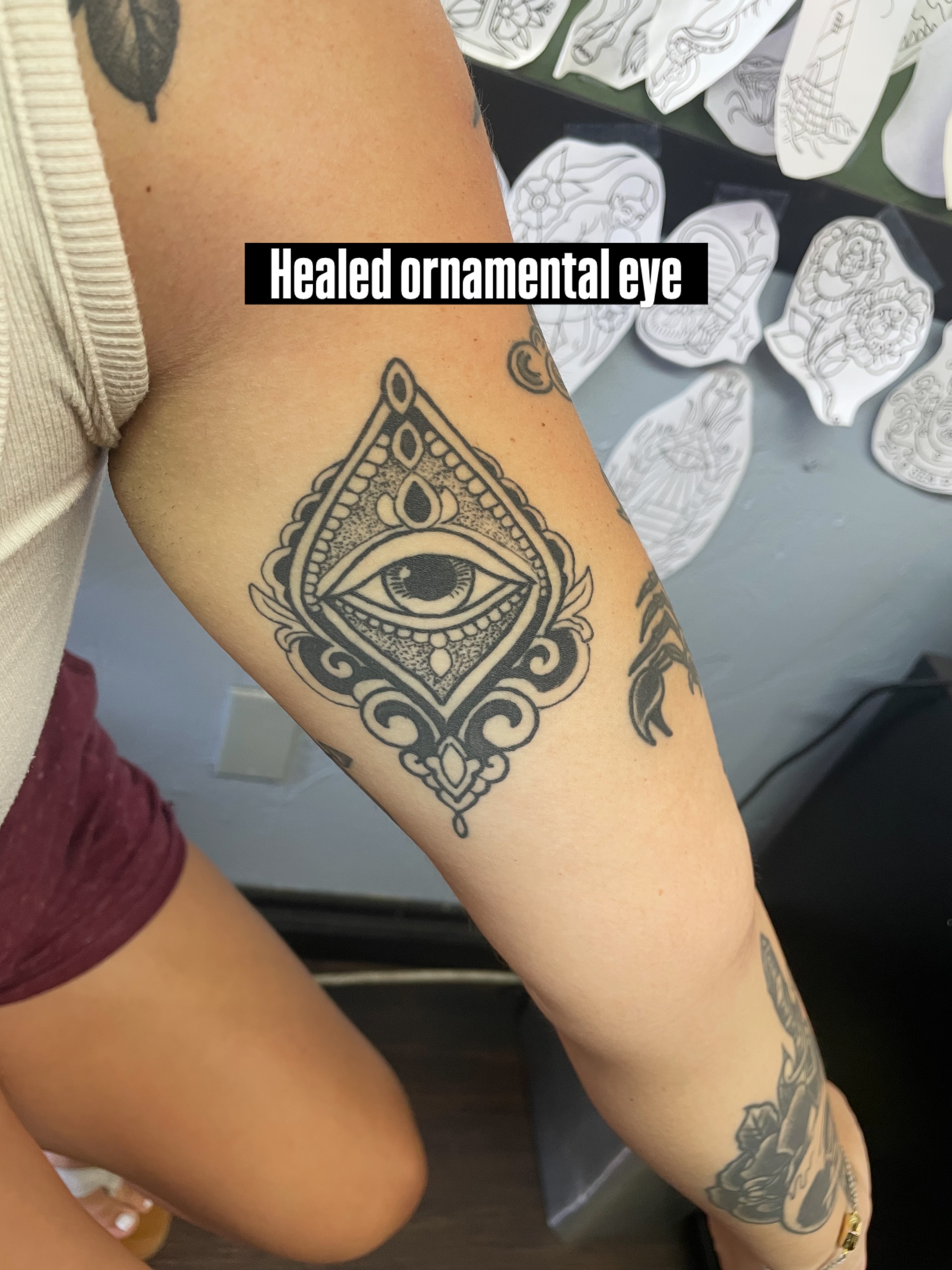 Ornamental eye ornamental tattoo on the forearm by San Diego Tattoo Artist