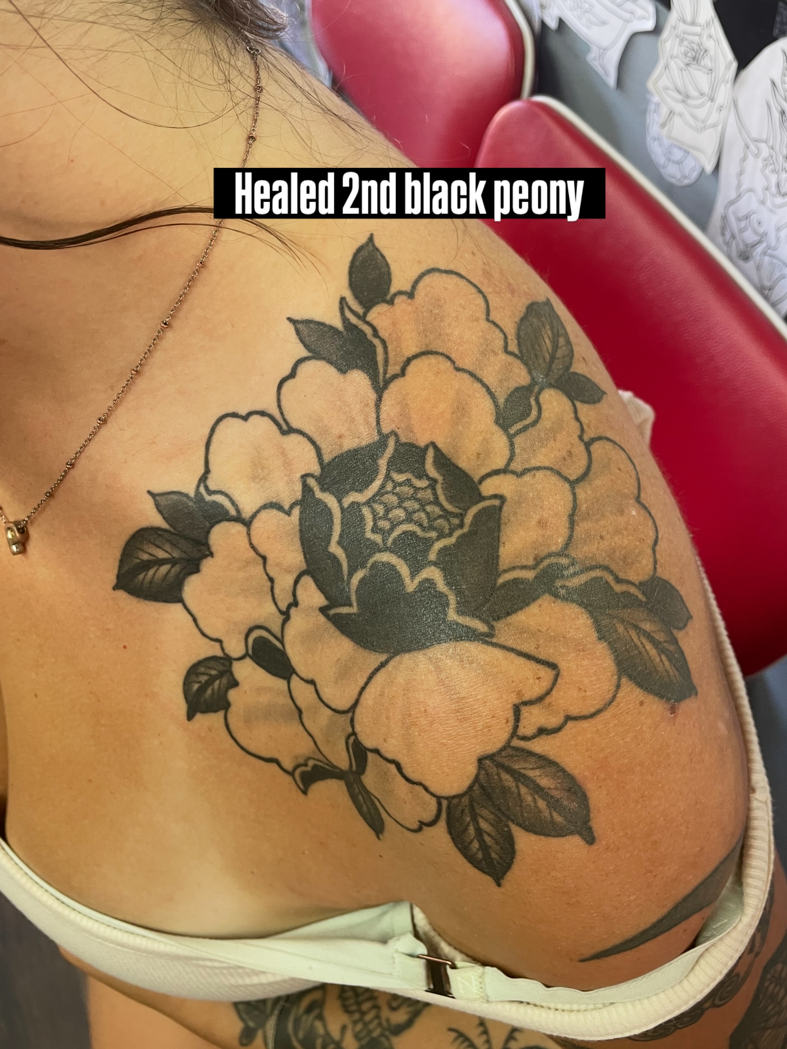 Peony black and grey tattoo on the shoulder by San Diego Tattoo Artist