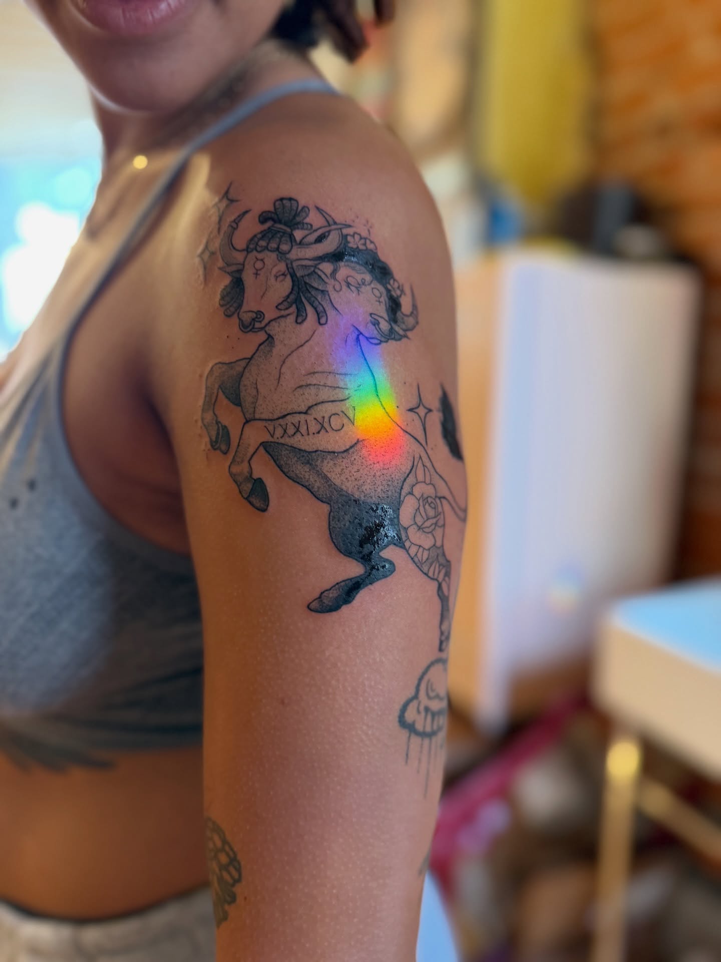 Bull and rose black and grey tattoo on the upper arm by V ☆ Cincinnati Tattoo Artist