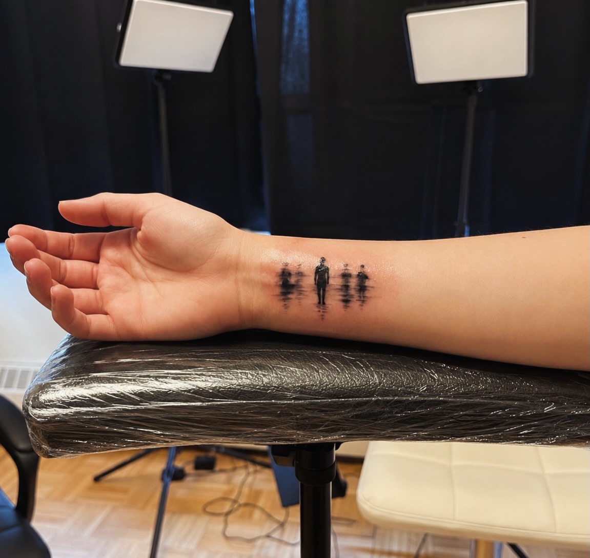 Silhouettes black and grey tattoo on the forearm by I N K S L A y e R