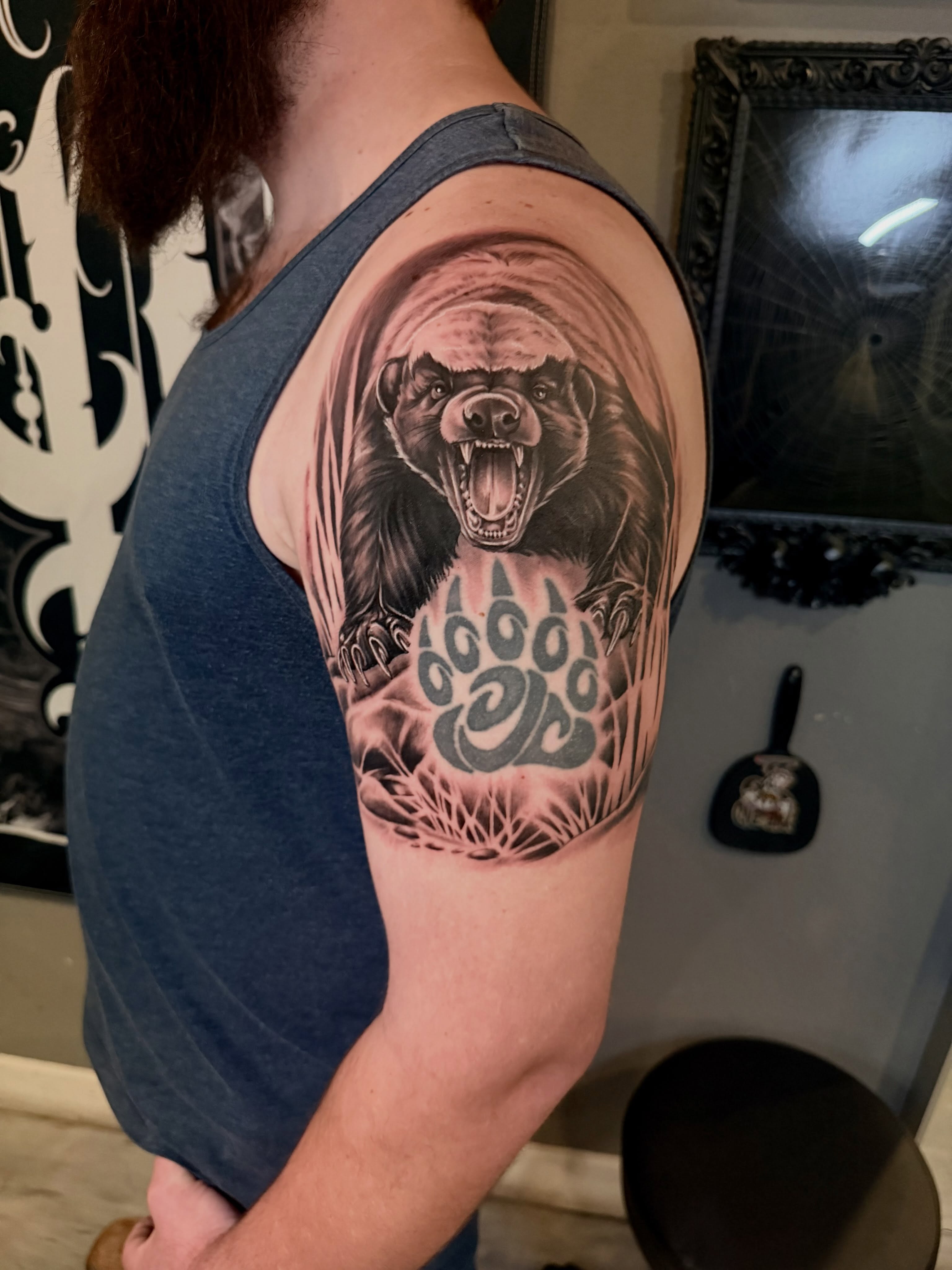Bear realism tattoo on the shoulder by Cody Pappas